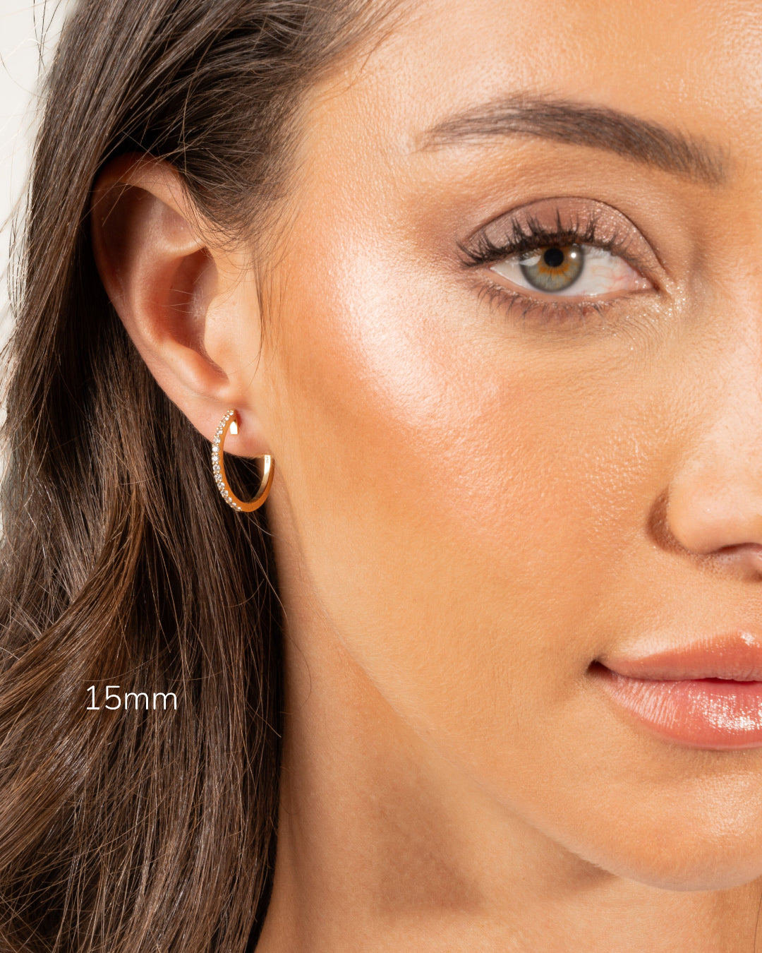 Model showcasing 15mm diamond hoop earring in rose gold, highlighting its elegance and timeless design.