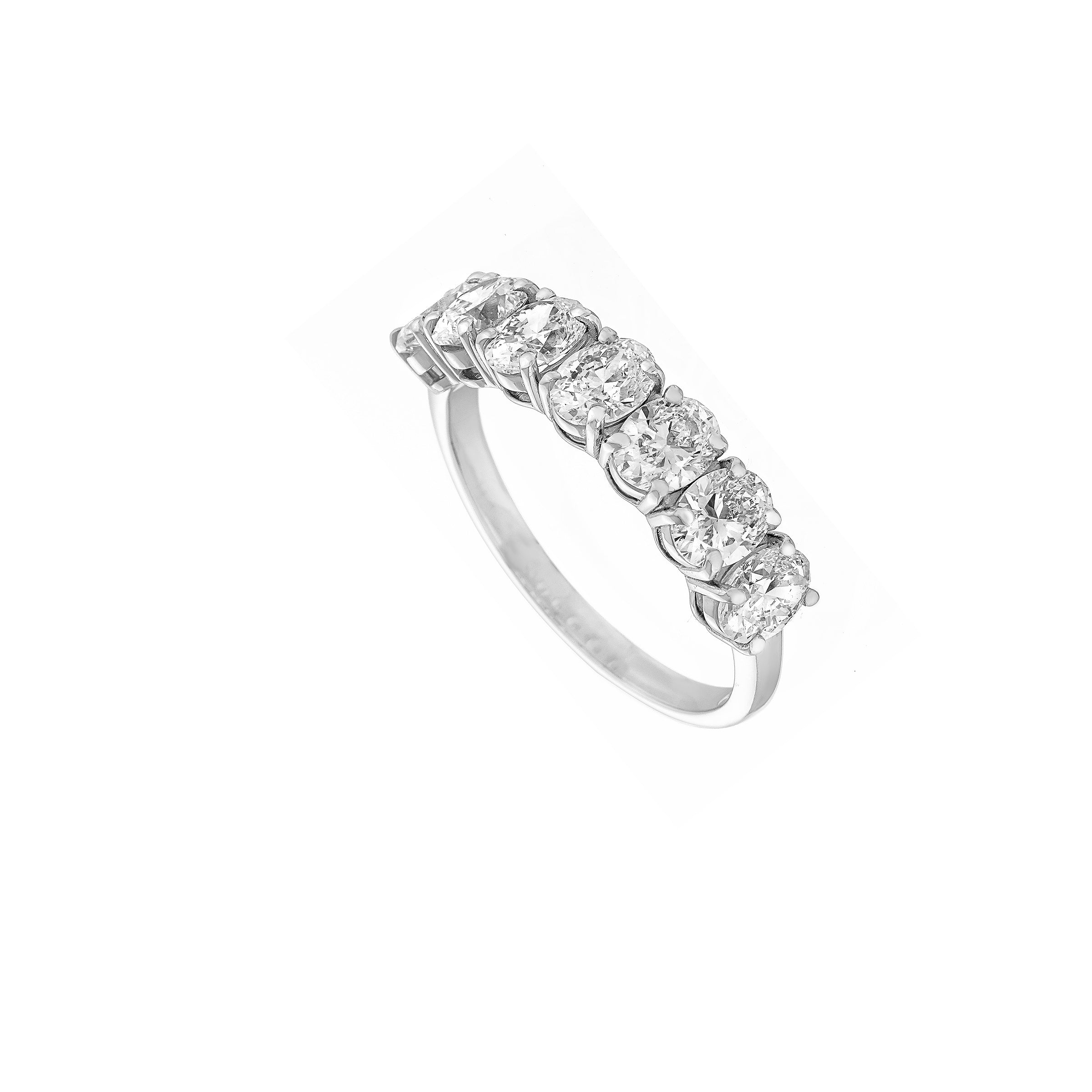 Seven stone oval certified diamond ring showcasing exquisite craftsmanship and brilliant sparkle.