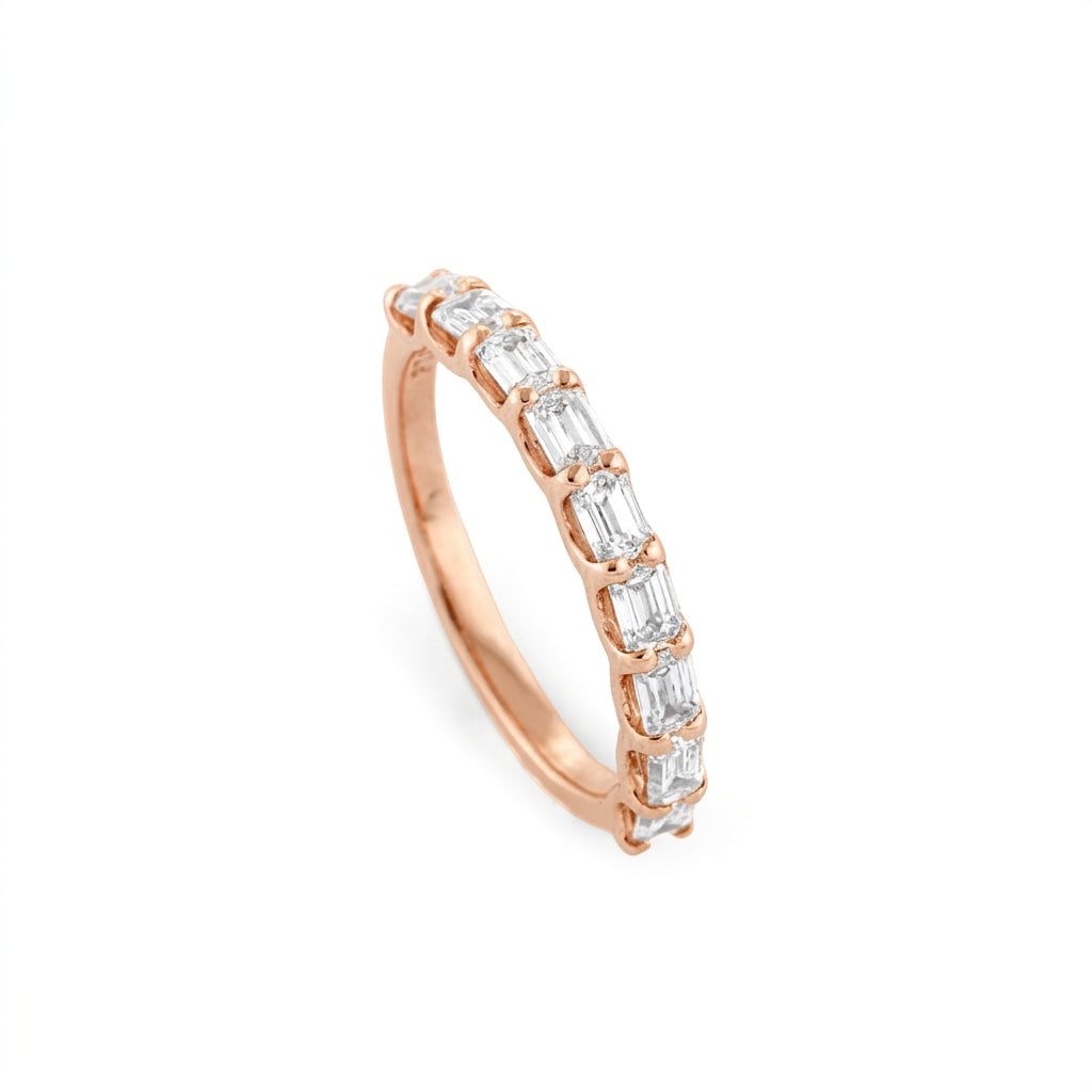 End to End Emerald Cut Diamond Ring in 18ct rose gold with nine diamond stones creating a continuous sparkle.
