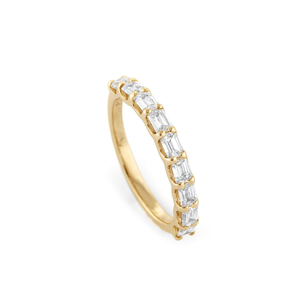 End to End Emerald Cut Diamond Ring in 18ct yellow gold featuring nine sparkling emerald cut diamonds