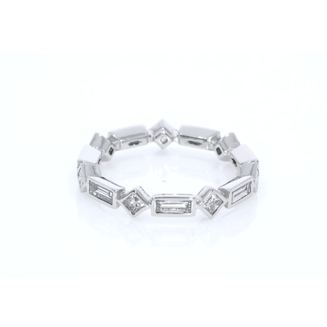 Modern Baguette bezel ring white gold colour with 1.35cts of princess and baguette cut certified natural diamonds.