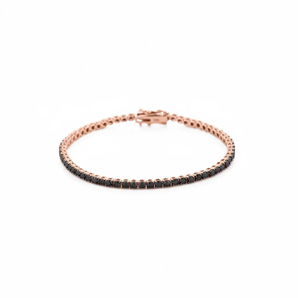 Rose gold tennis bracelet with black diamonds on a white background