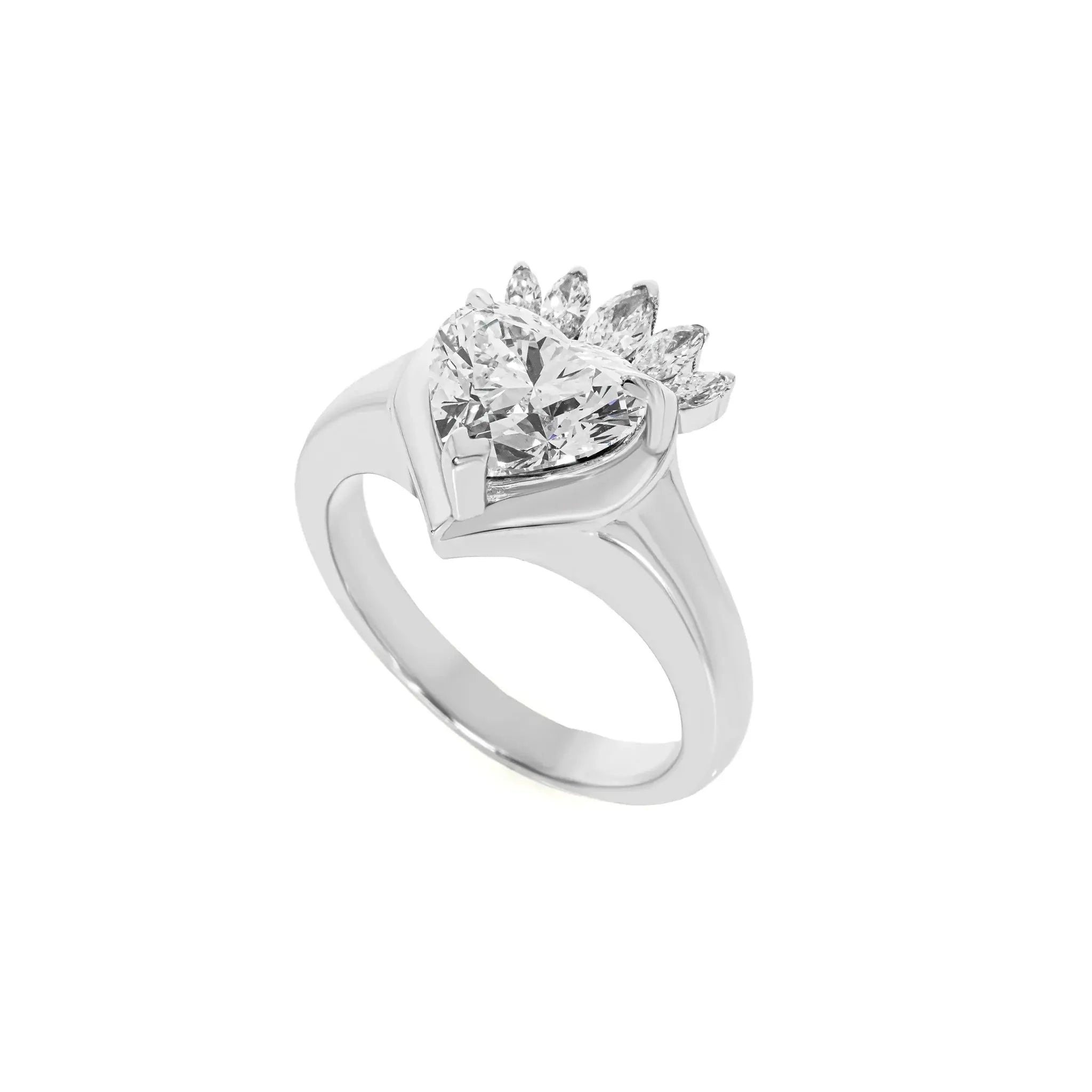 White gold claddagh ring with a heart-shaped diamond