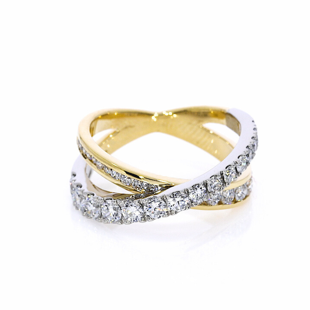The Coco Criss Cross Ring featuring certified diamond rings crafted in platinum and 18ct yellow gold.