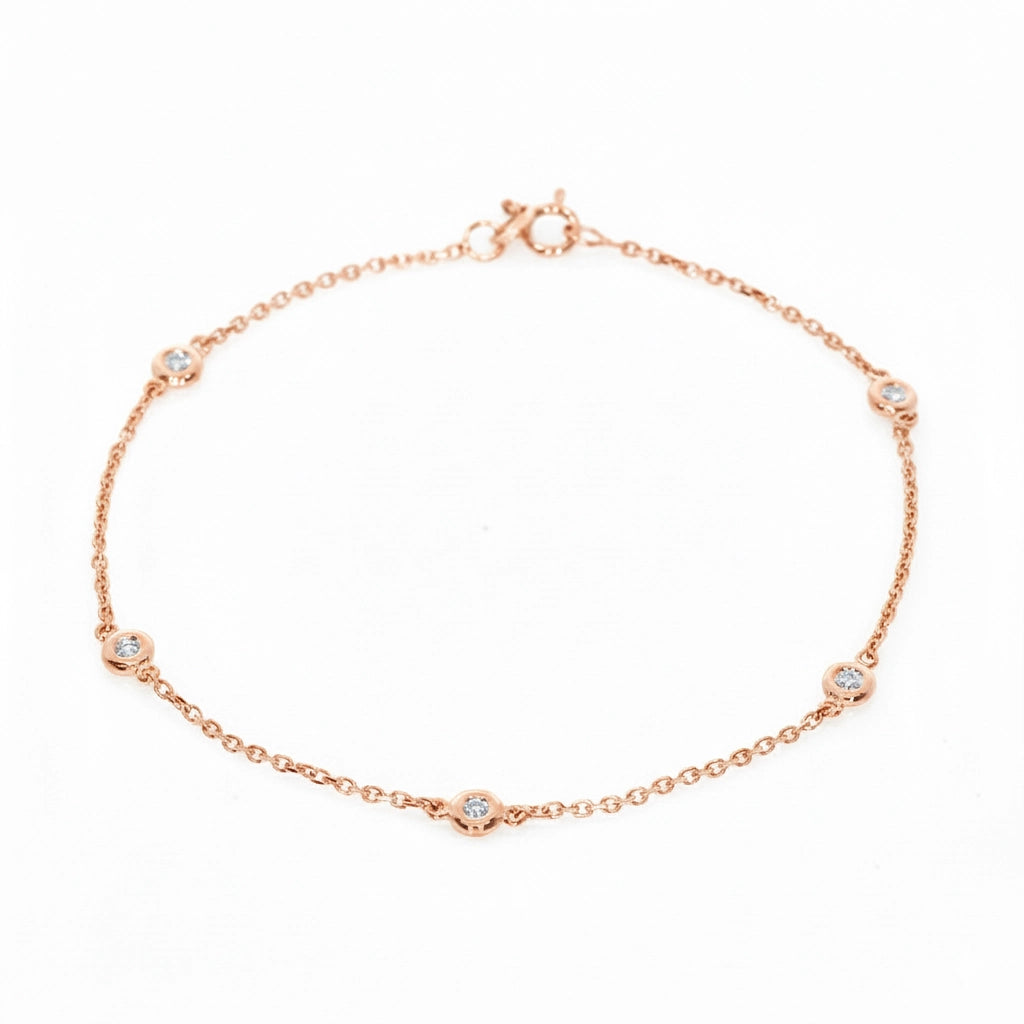 Feminine Constellation rose gold bracelet featuring five certified diamonds set in fine bezel, perfect as a diamond bangle.