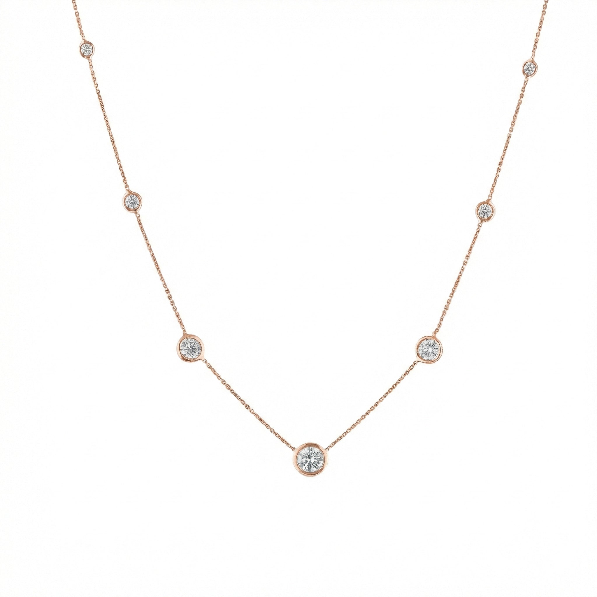 Constellation Necklace - Graduating featuring delicate bezel set diamonds in rose gold.