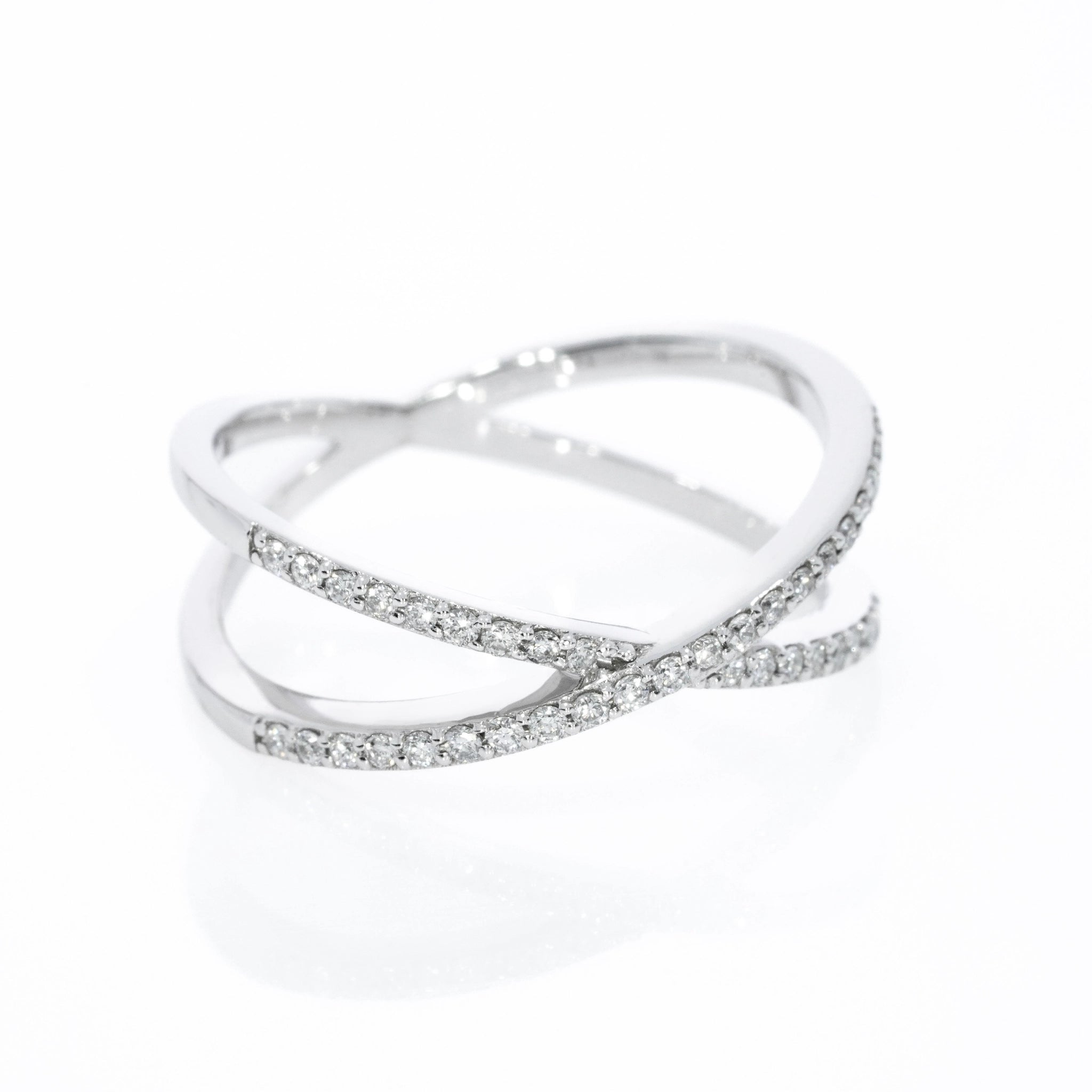 Criss-cross ring small size with 0.18cts certified diamonds, in 18ct white gold with stylish bands intersect for a sparkling look.