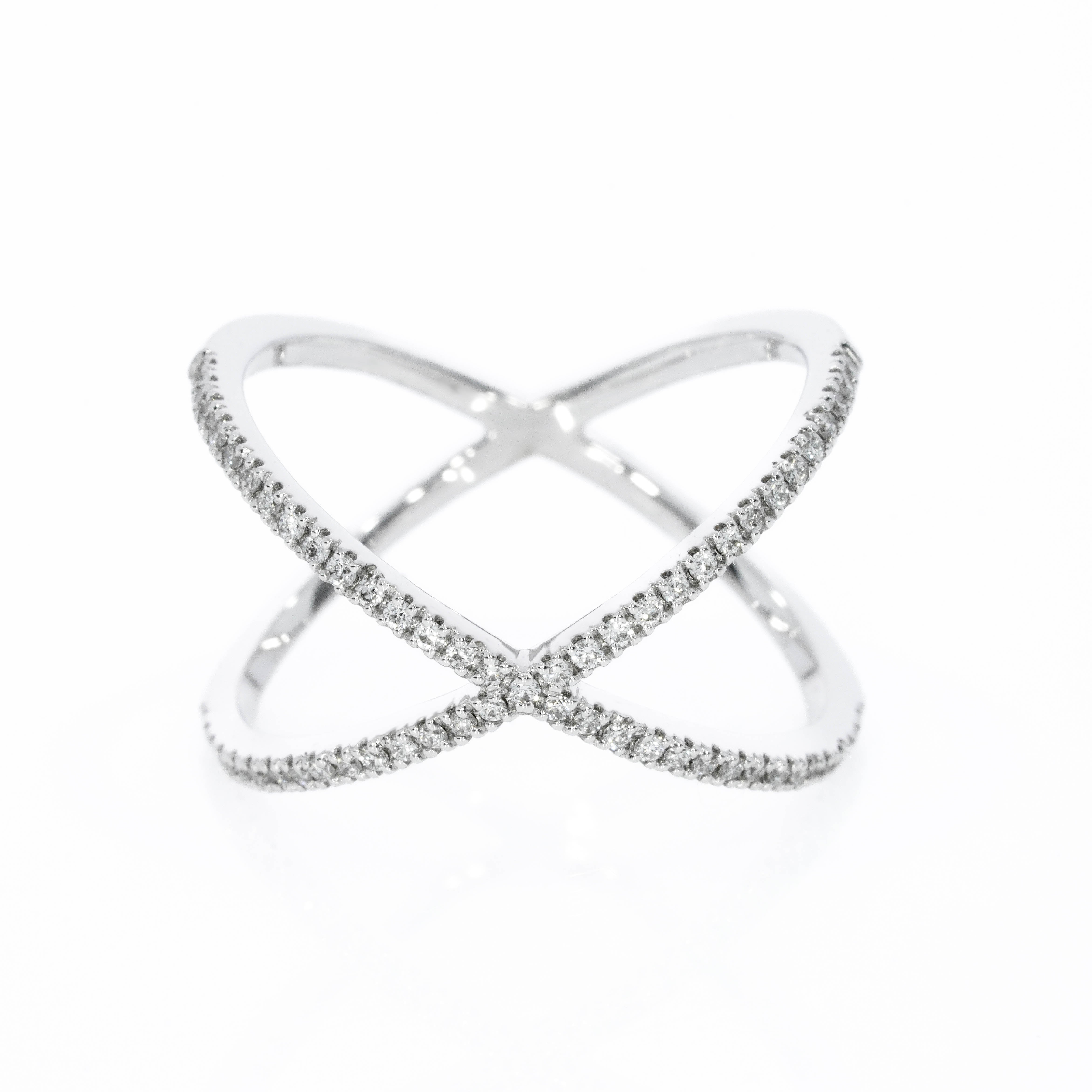 Medium criss-cross ring with 0.23cts round brilliant cut diamonds, white gold colour set in 18ct gold.
