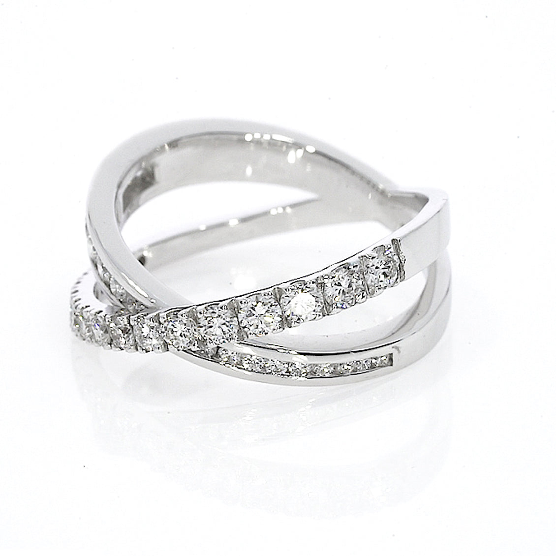 Criss-cross ring large with 0.84cts of claw-set luxury fine diamonds, intersecting bands for a sparkling look set in 18ct gold.