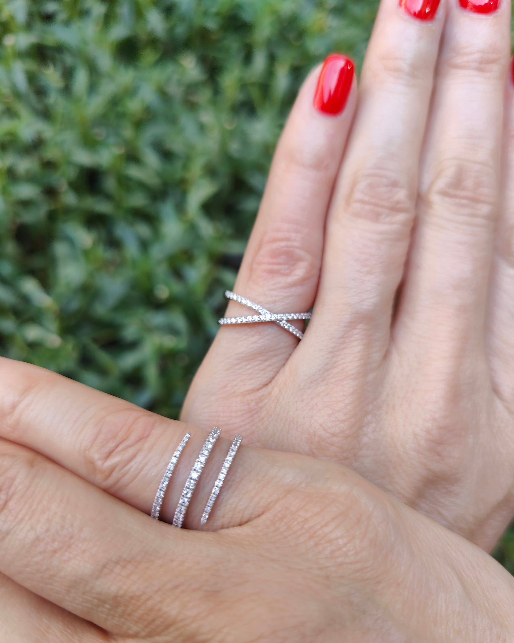 Model wearing certified diamond criss cross ring