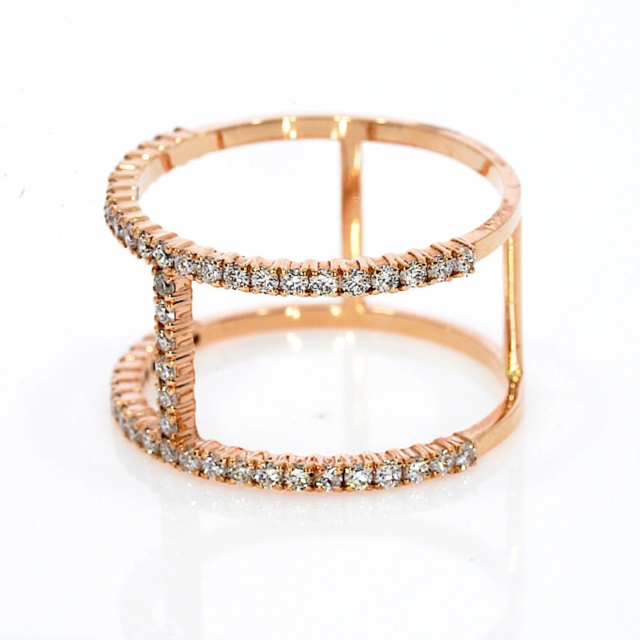Stunning H design ring rose gold colour, with 0.62cts of round brilliant cut diamonds, set in 18ct gold.