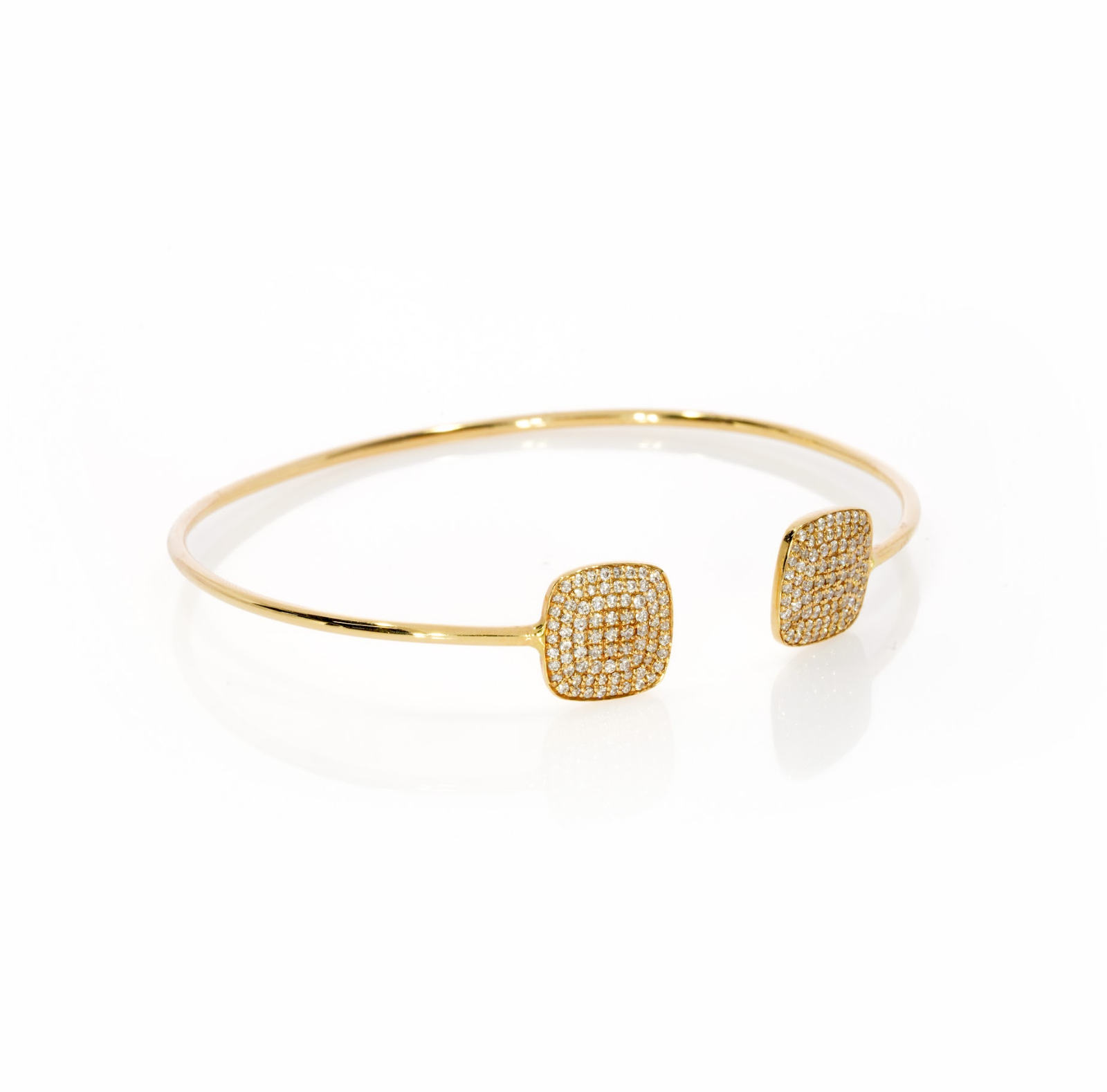 Gemini bangle featuring certified diamond bracelet with sparkling gold and round brilliant diamonds in elegant squares.