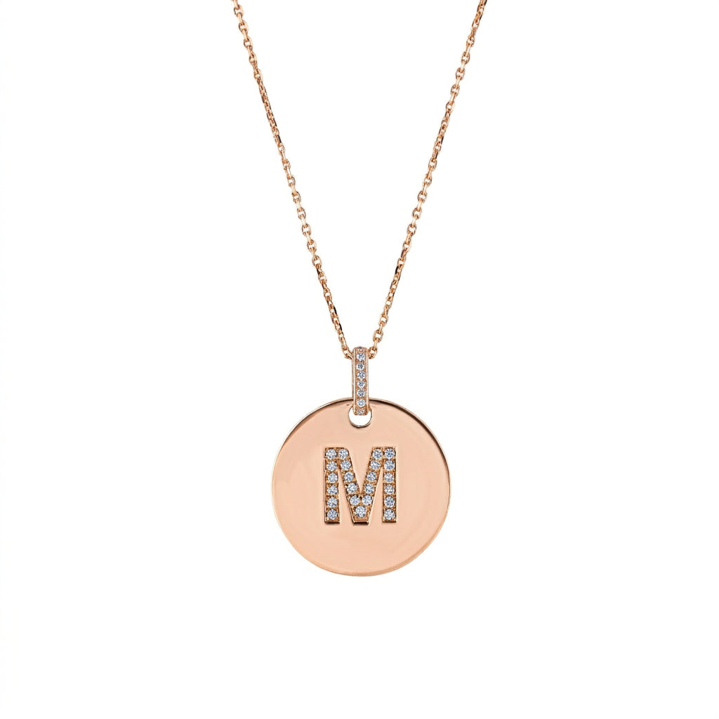 Love Letter Disk necklace with initial M in certified diamonds set in rose gold chain.