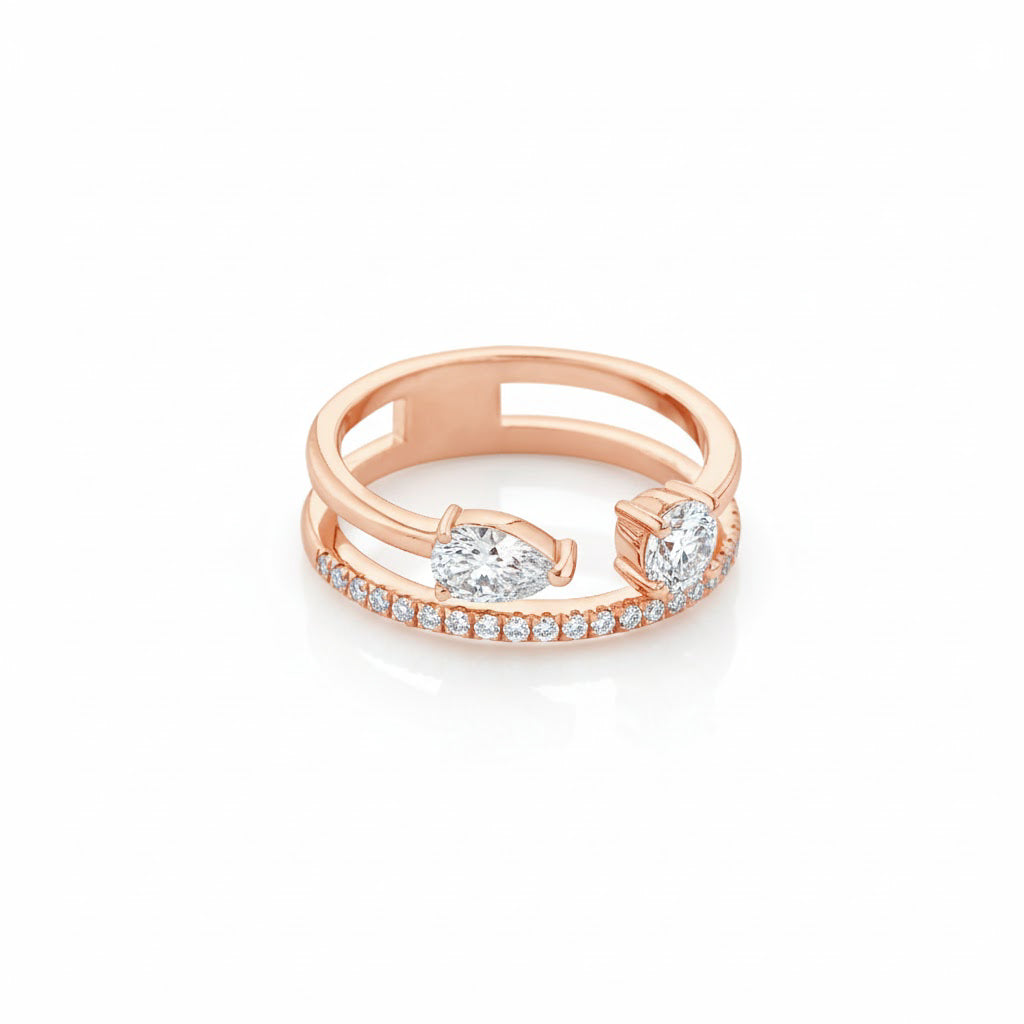 Rose gold ring with diamonds on a white background