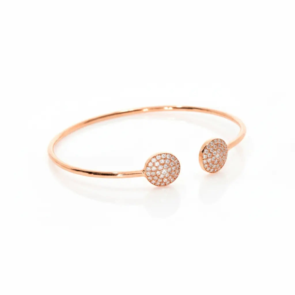 Gemini bangle with round brilliant certified diamonds, a stunning diamond bangle in 18ct rose gold, perfect for elegant styling.