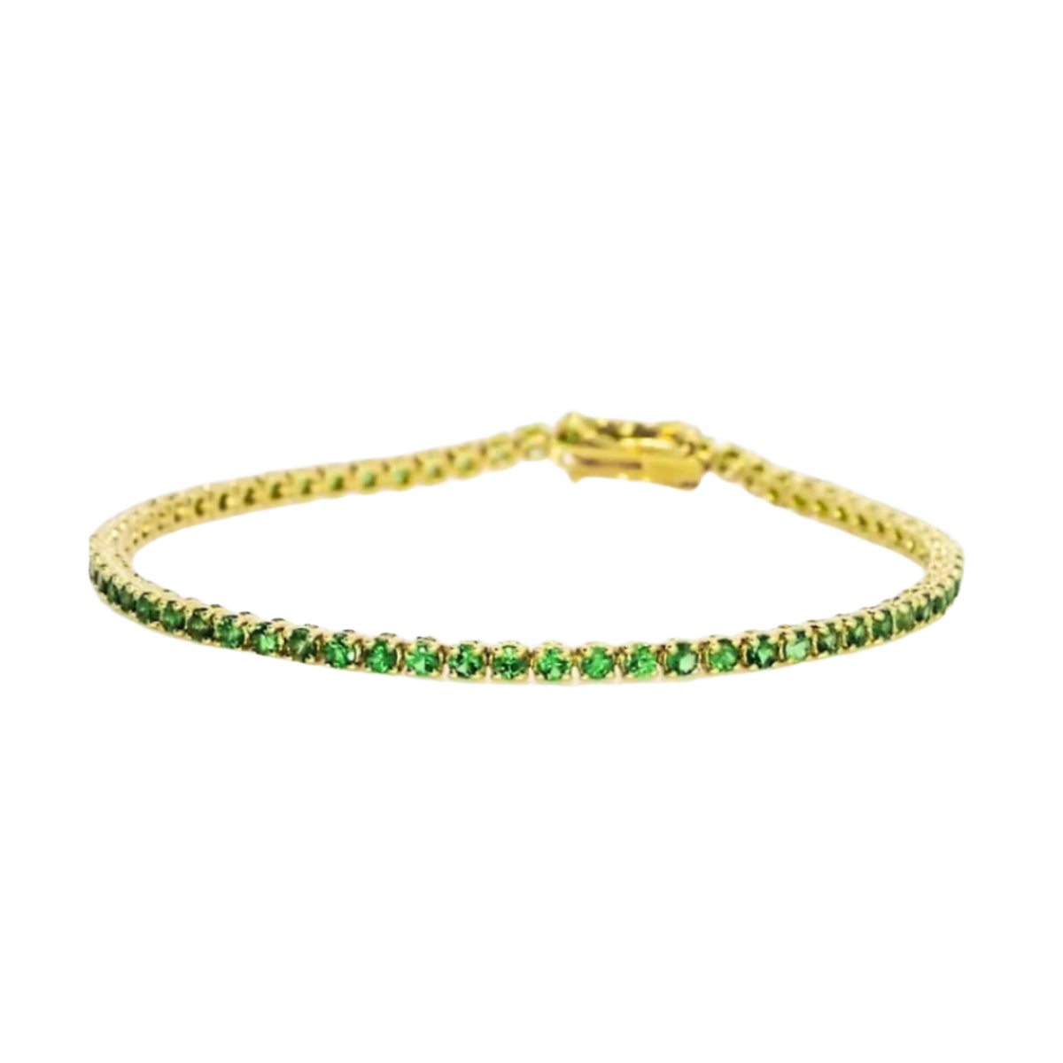 Green tsavorite tennis bracelet set in 18ct yellow gold showcasing exquisite Green tsavorites from our gemstone tennis bracelet collection.