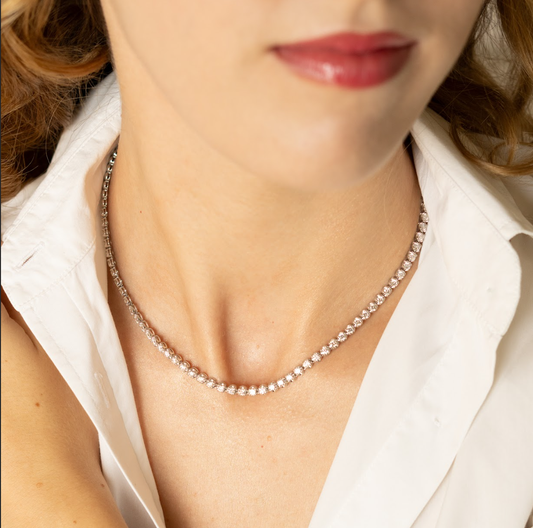 Elegant half diamond tennis necklace showcasing certified diamonds, perfect for layering with other jewellery.