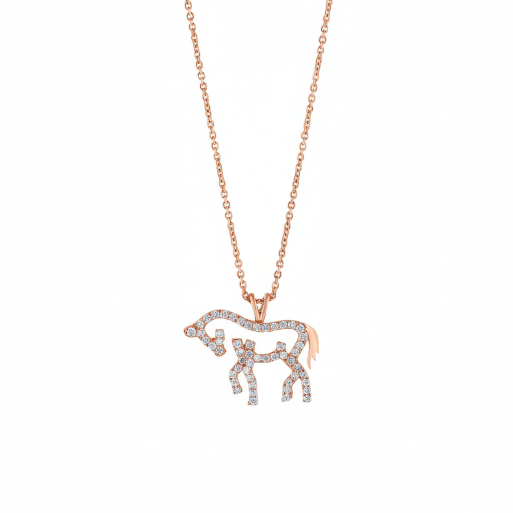 Rose gold necklace with a diamond horse pendant on a white background