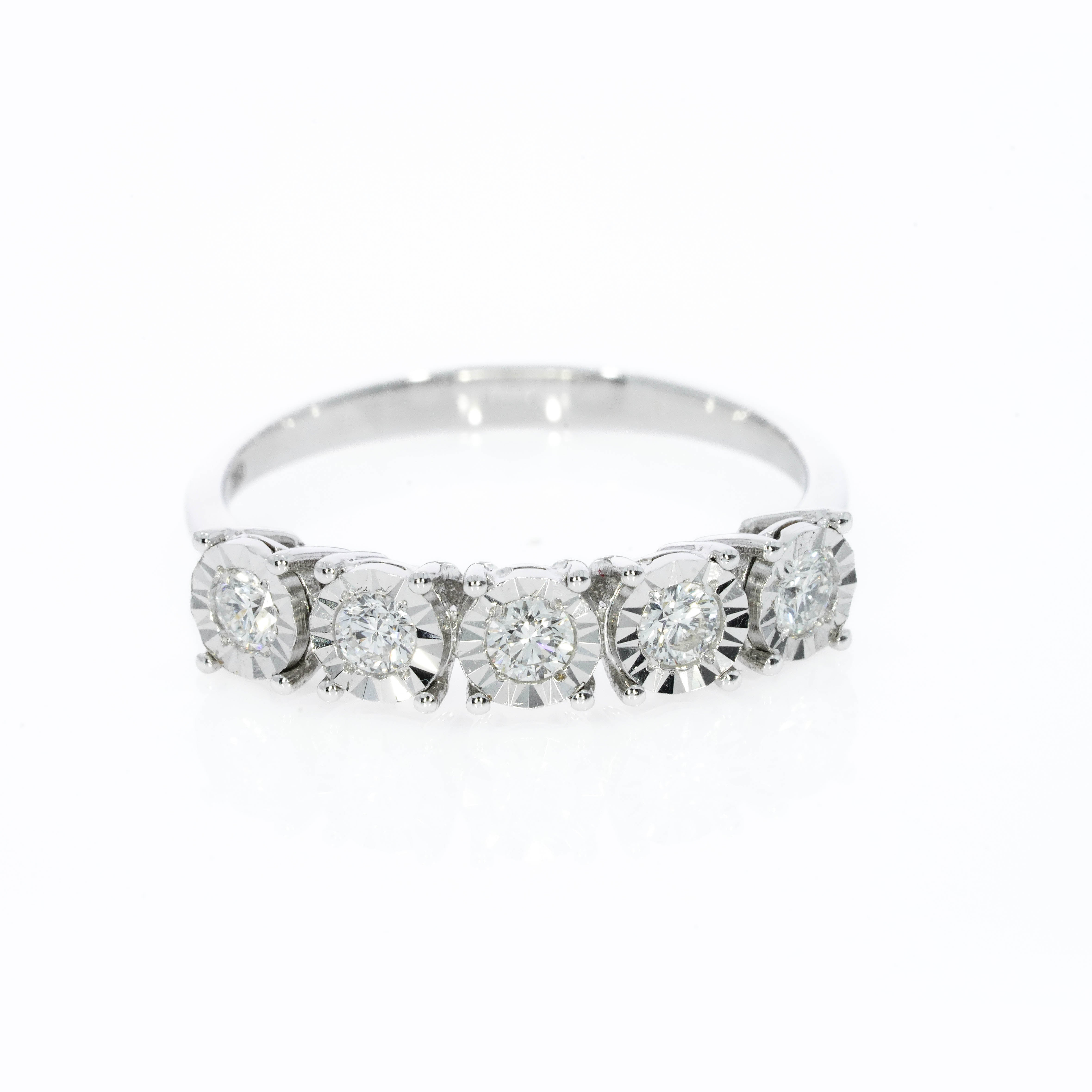 Eternity Ring with Five round brilliant cut diamonds in a setting that makes each appear larger and adds extra sparkle.
