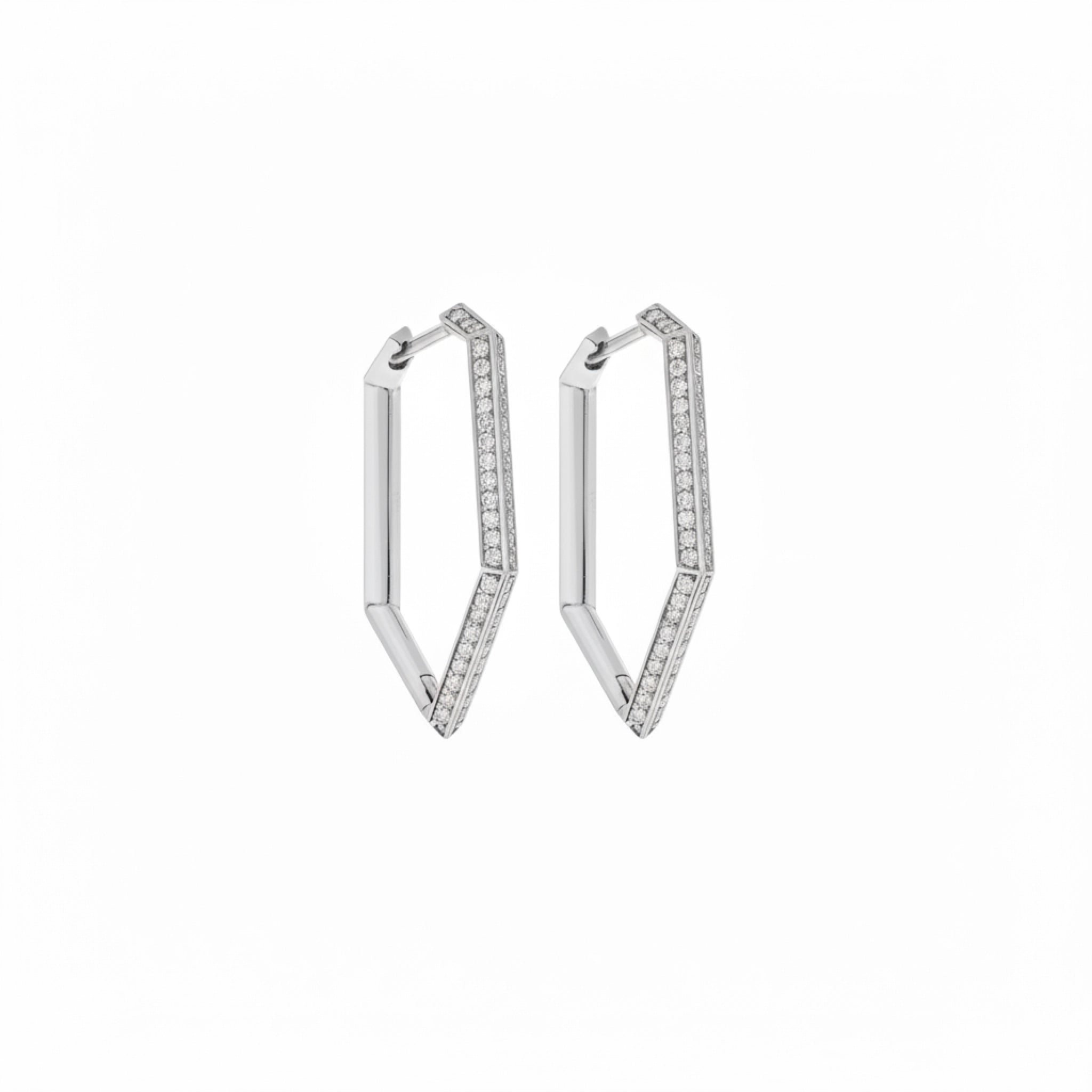Pair of white gold hoop earrings with embedded diamonds on a white background