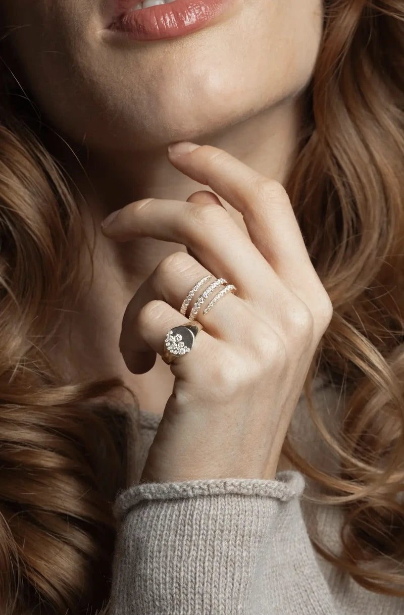 Model showcasing a swirl ring in certified diamond rings collection, highlighting elegance and sparkle.