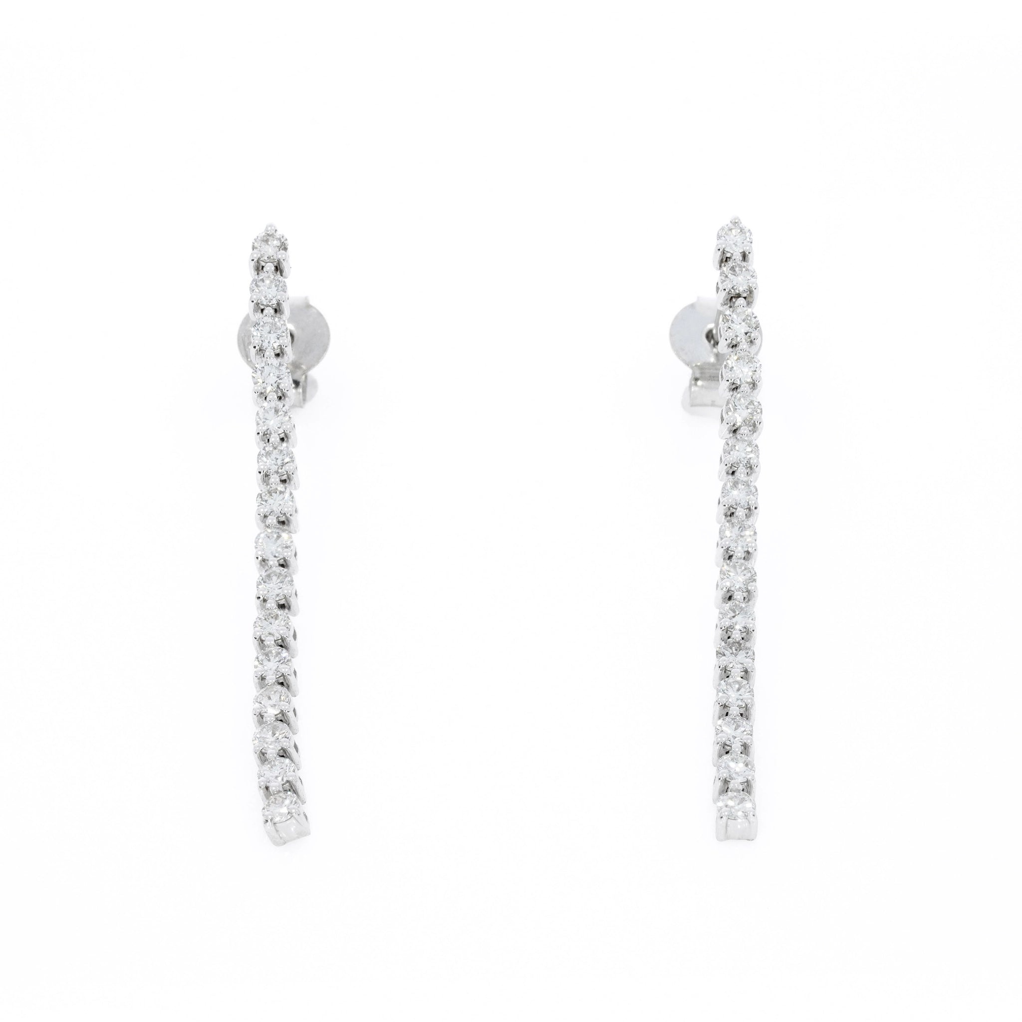 Elegant Diamond Line earrings featuring diamonds set in solid gold, perfect for any occasion.