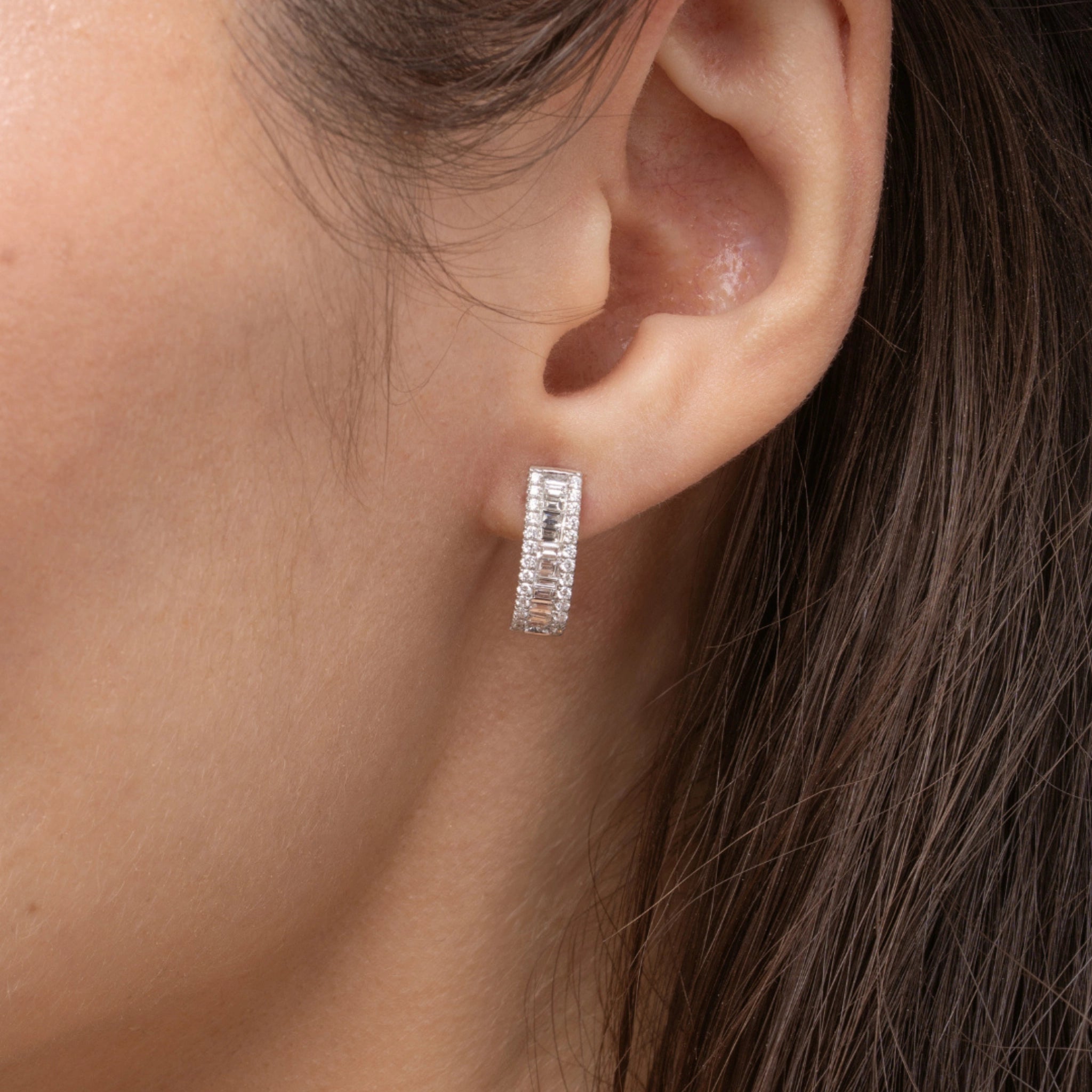 Close-up of Love Eternity Earrings, elegant diamond earrings set in 18ct white gold, showcasing sparkle and glamour.