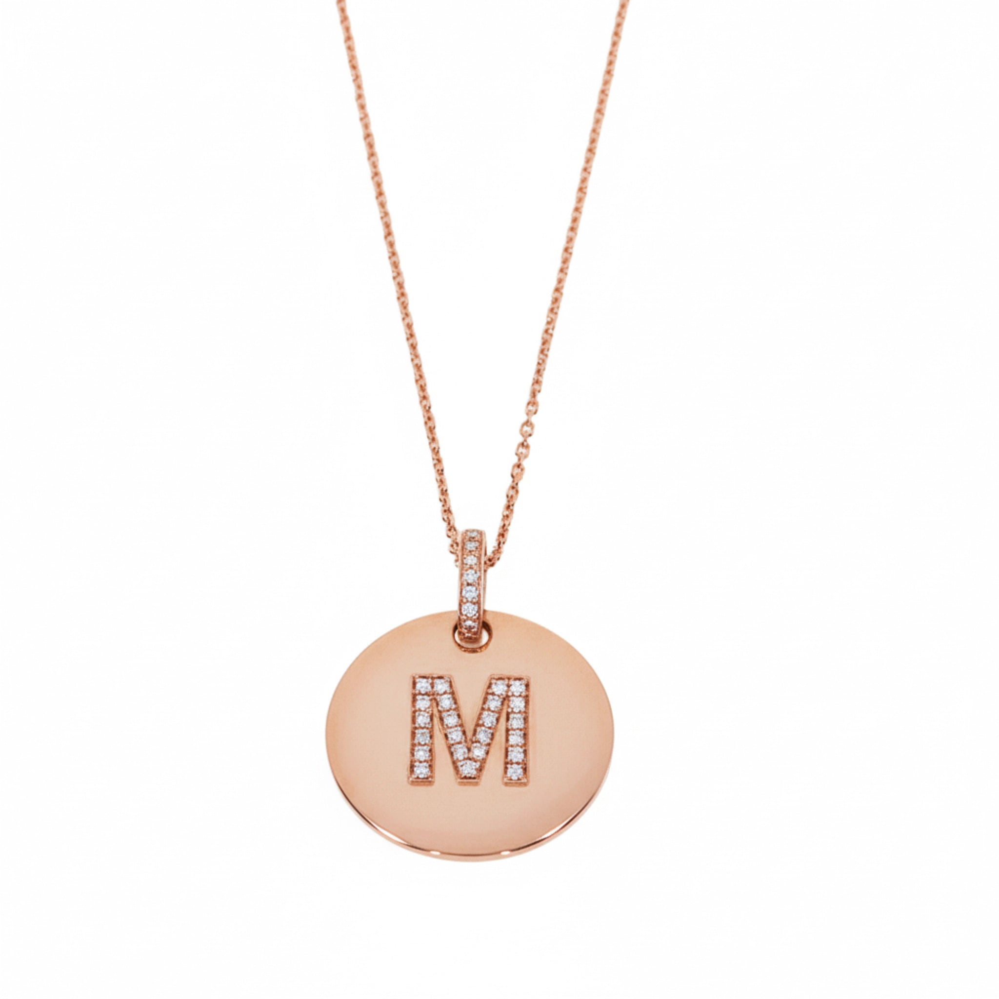 Love Letter Disk necklace with initial M in certified diamonds set in rose gold chain.