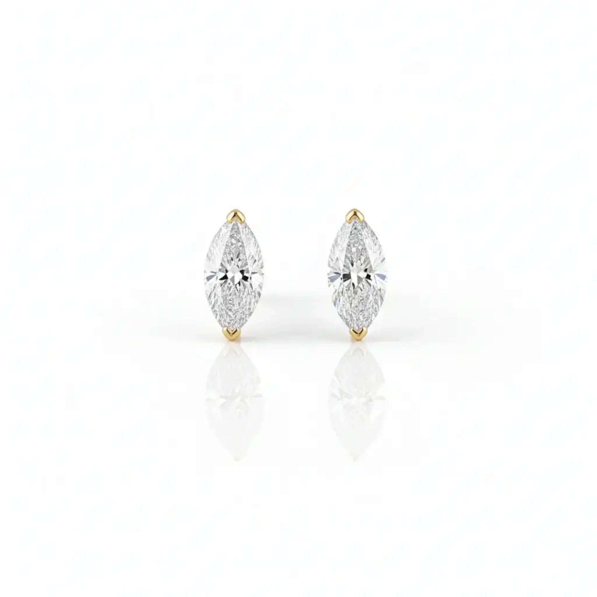 Marquise cut diamond earrings with a crisp sparkle, featuring 1.00ct diamonds set in yellow gold.