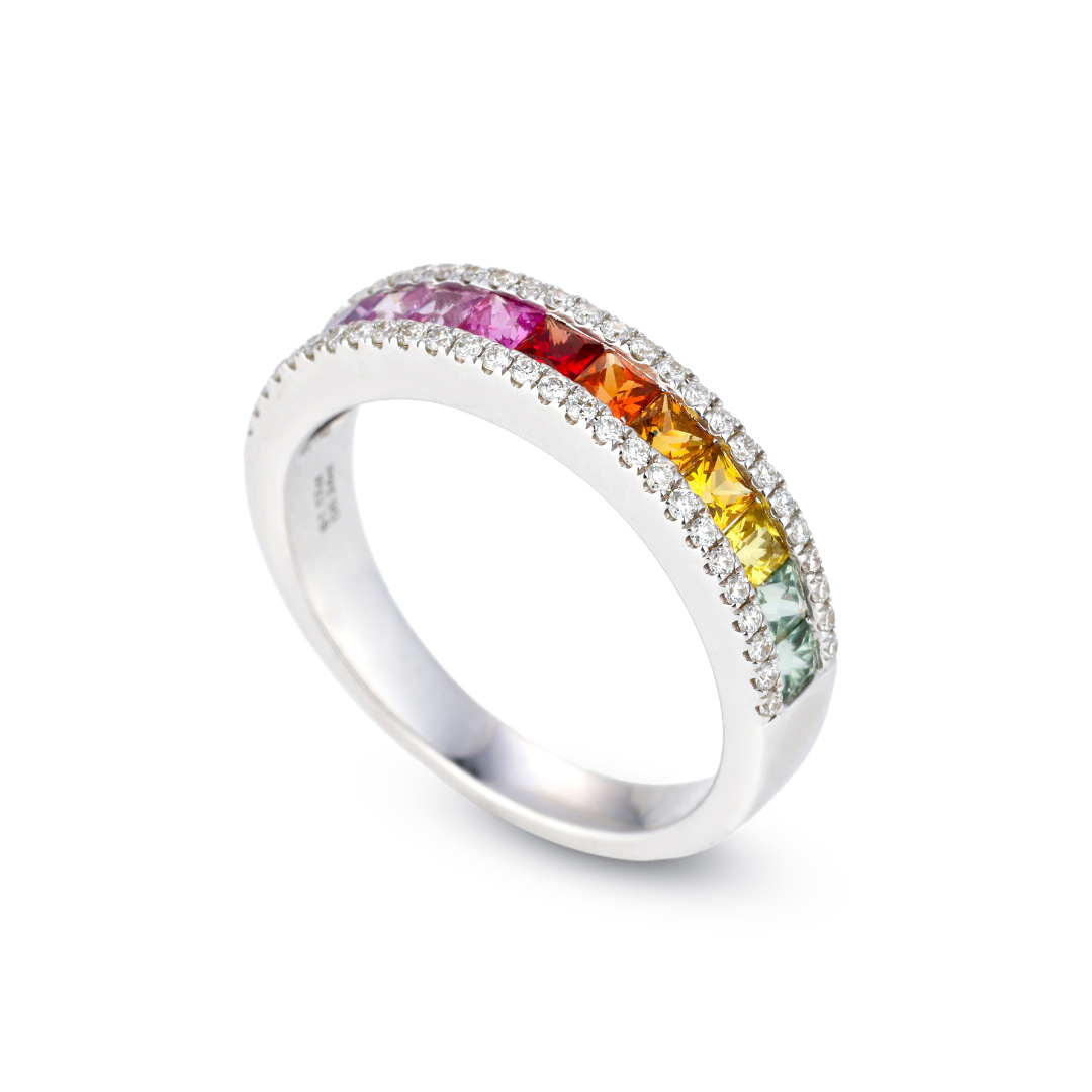 Coloured Sapphire ring with princess cut sapphires and natural round brilliant diamonds for added sparkle.