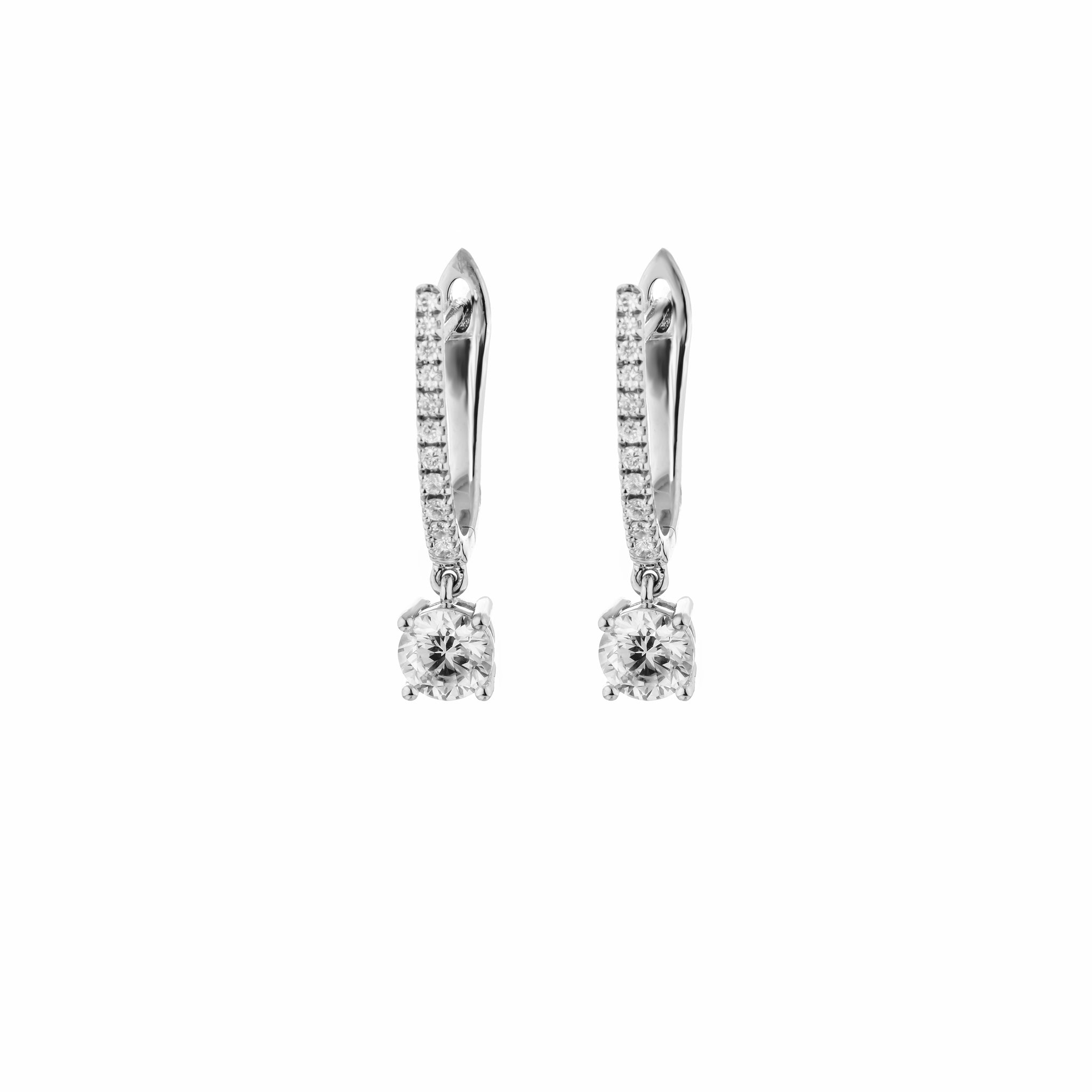 Pair of diamond earrings on a white background