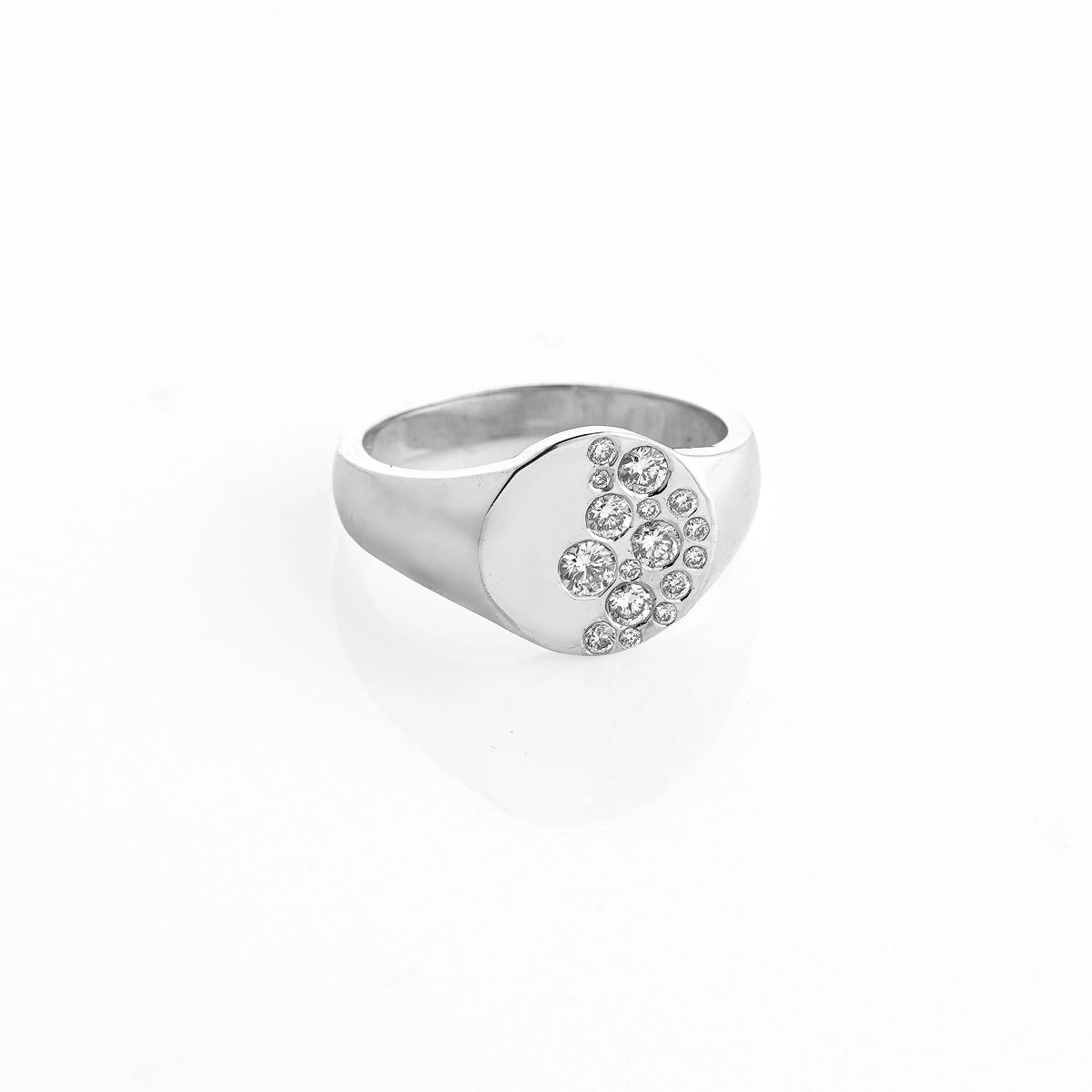 Beautiful diamond ring featuring scattered diamonds, evoking elegance and modern simplicity