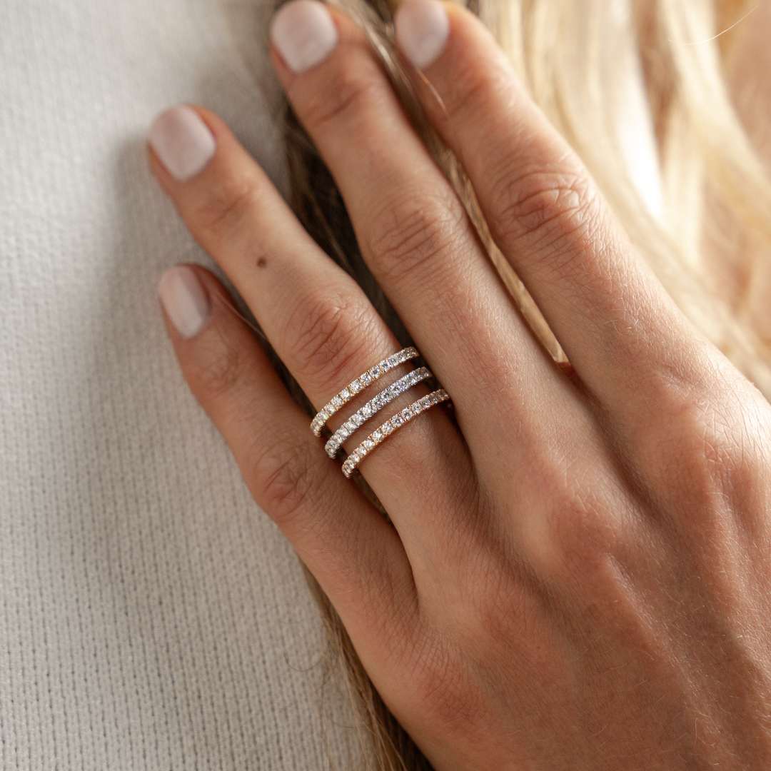 Ultra-modern, three-color gold ring with 1.04cts round brilliant cut diamonds, set in 18ct gold.