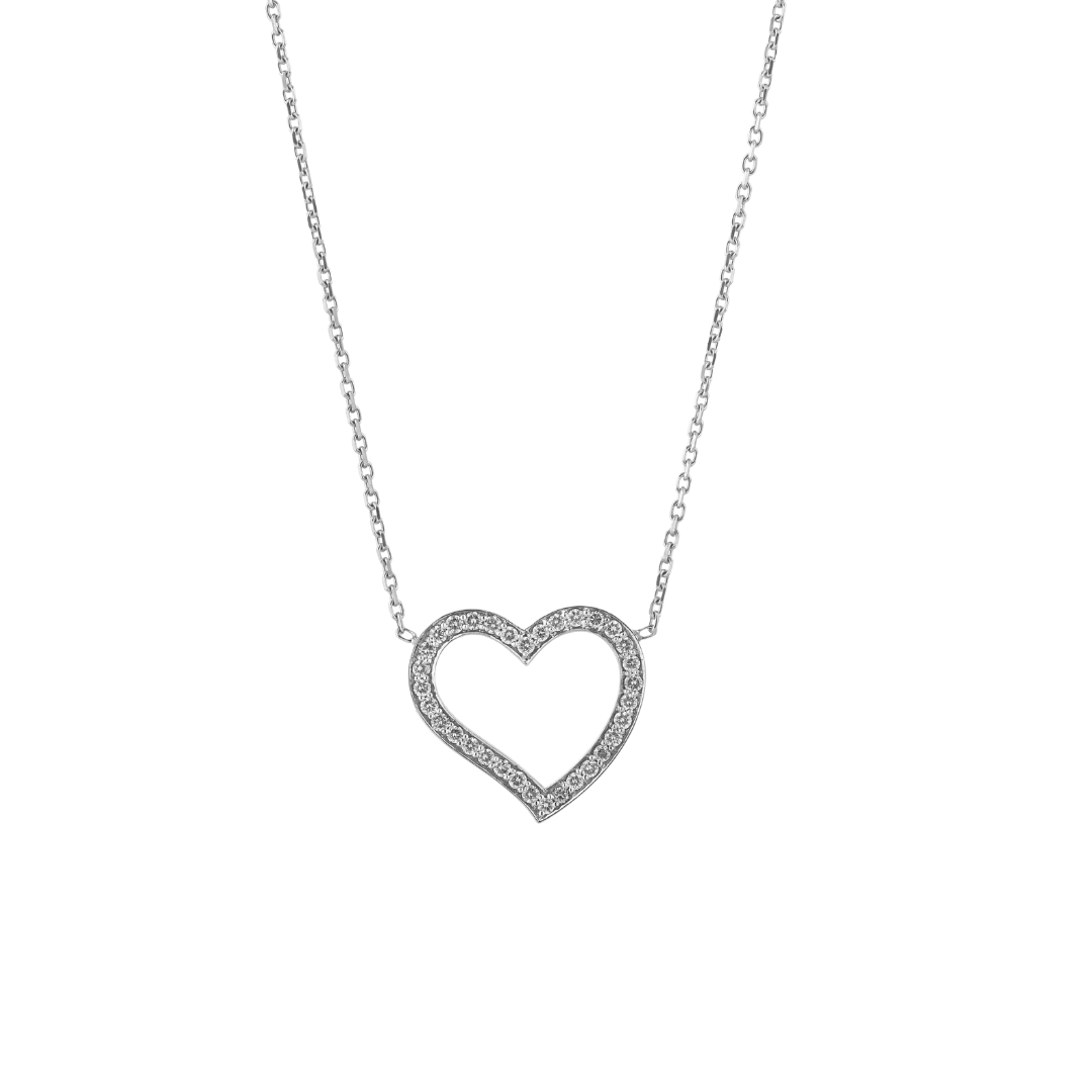 Amélie heart pendant necklace in 18ct gold with round brilliant diamonds, symbolising modern romance.