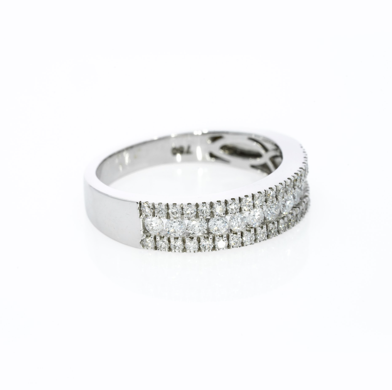 Pave diamond ring with 0.57cts diamonds, set in 18ct gold for optimal brilliance.