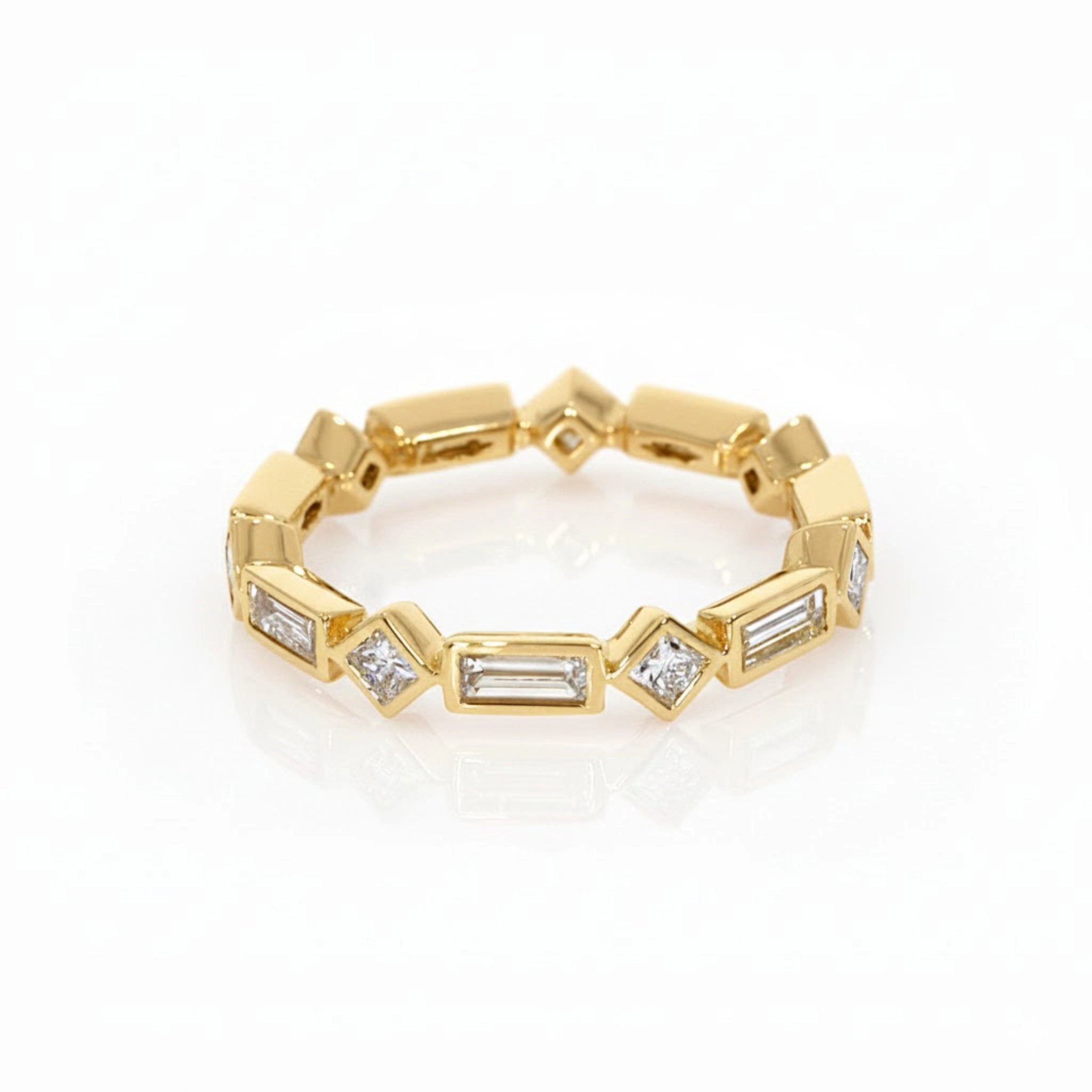 Baguette Bezel Diamond Ring featuring baguette and princess cut diamonds in 18ct yellow gold setting.