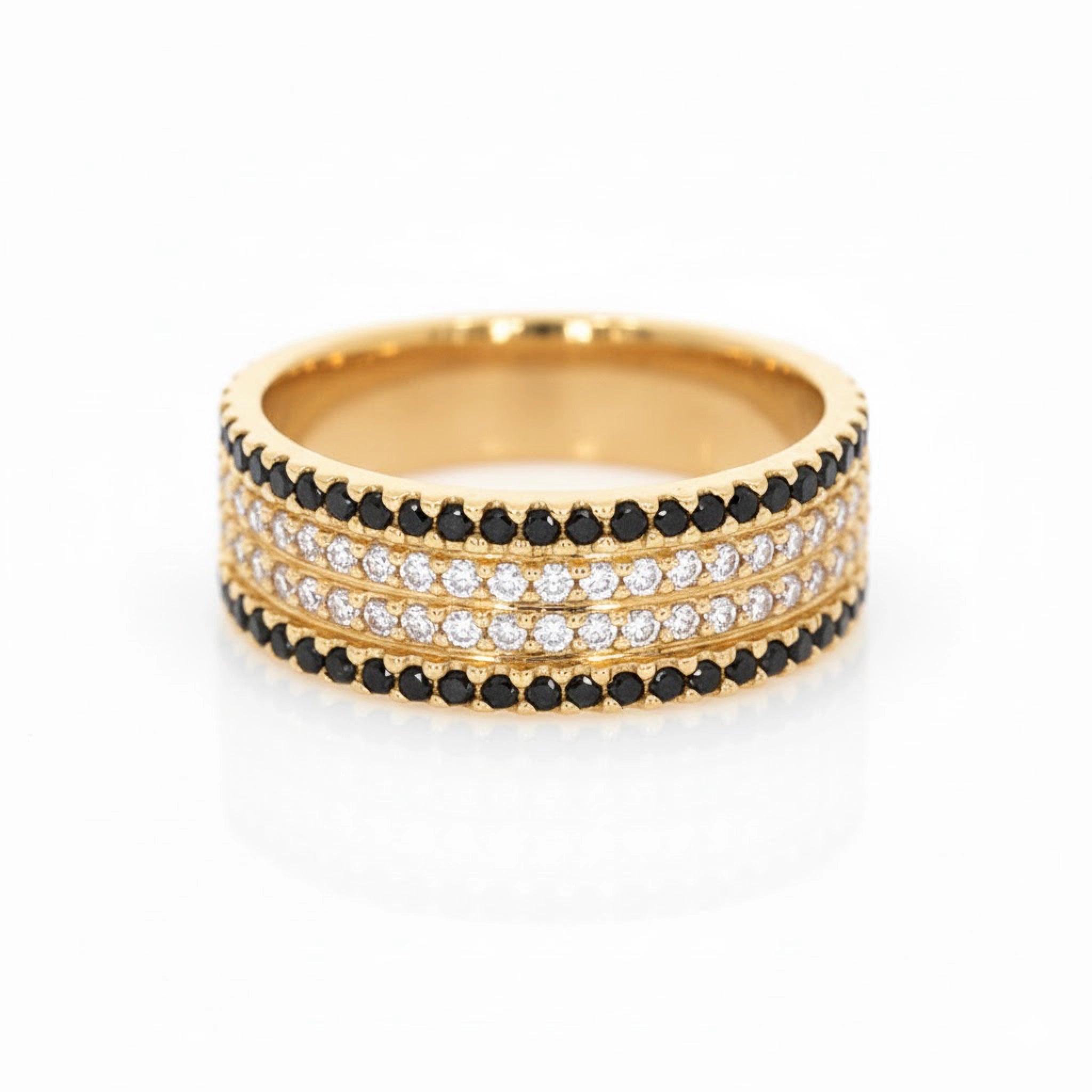 Elegant Black and White Diamond Ring featuring natural diamonds in 18ct yellow gold setting.