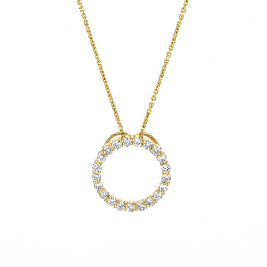 Circle Of Life Necklace - Medium featuring bright white diamonds in a gold setting on a delicate chain.