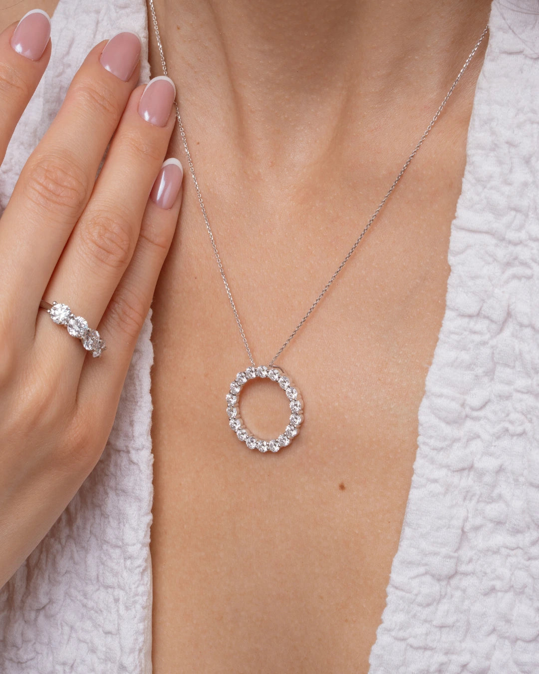 Circle Of Life Necklace - Large worn with a matching ring, featuring sparkling diamonds in a classic round design.