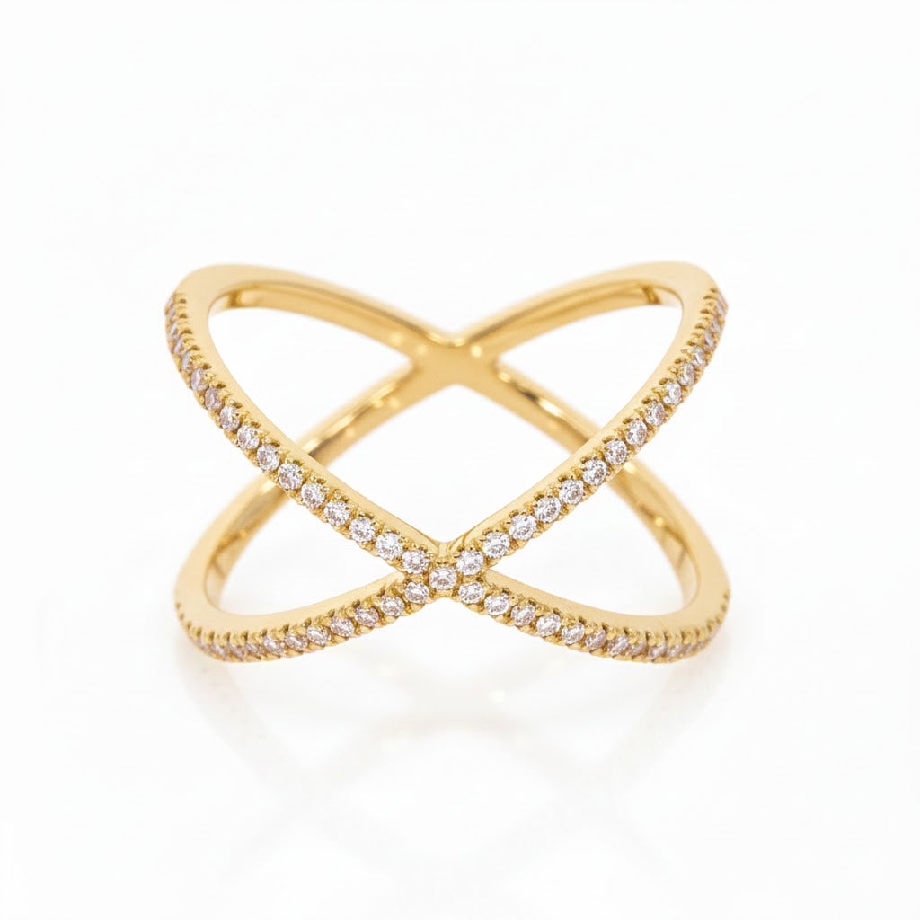 Elegant criss cross diamond ring in 18ct gold featuring claw set diamonds that intersect for a stunning sparkle.