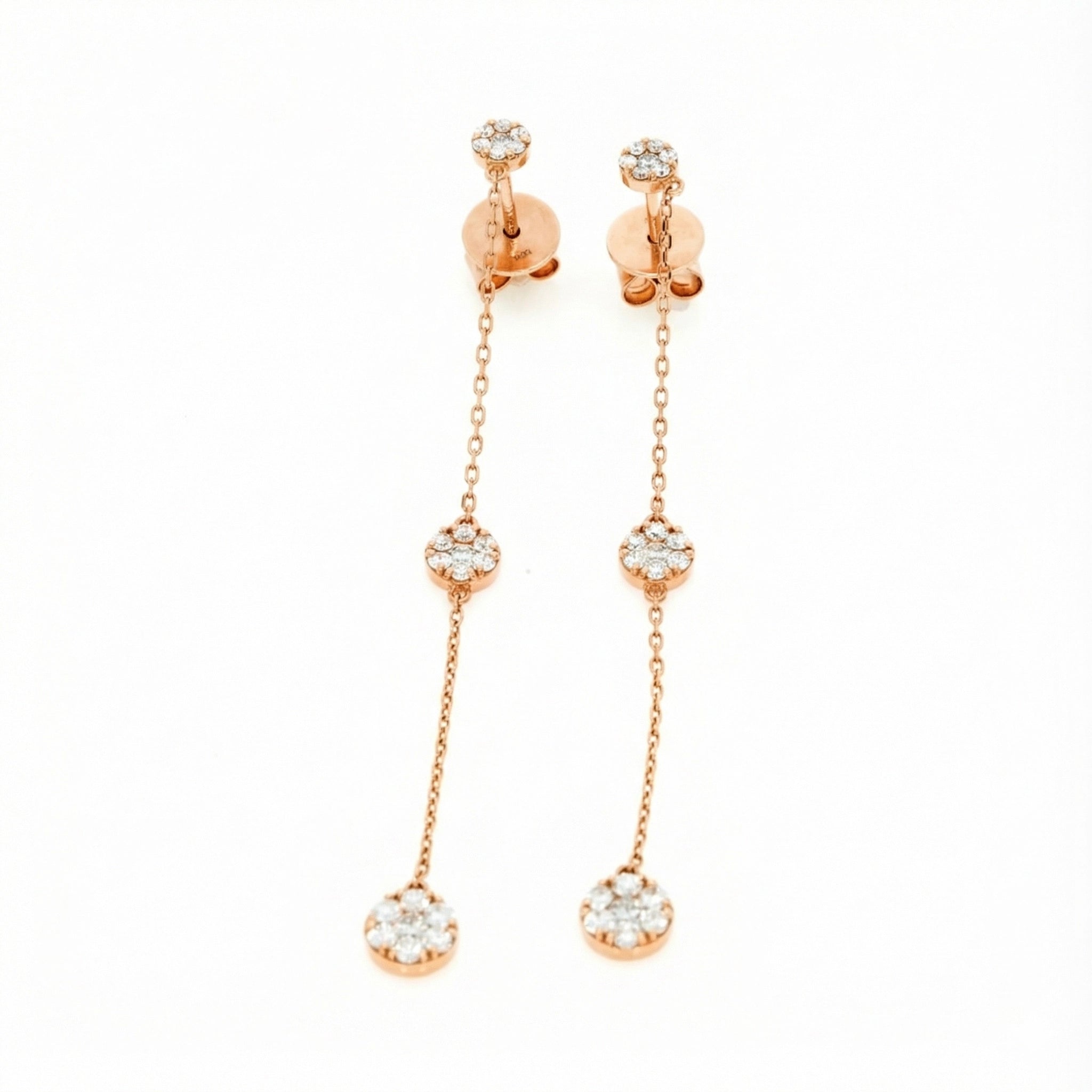 Elegant drop illusion earrings featuring certified diamond earrings in 18ct rose gold with diamond clusters