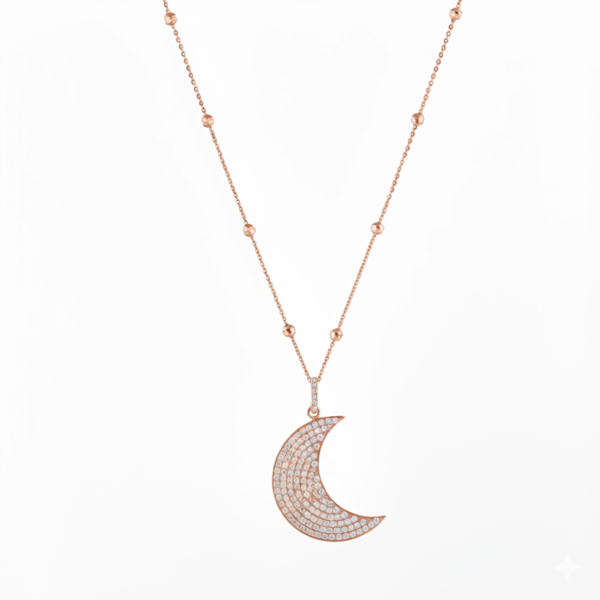 Long Moon necklace featuring diamond accents on an 18ct rose gold chain for modern elegance.