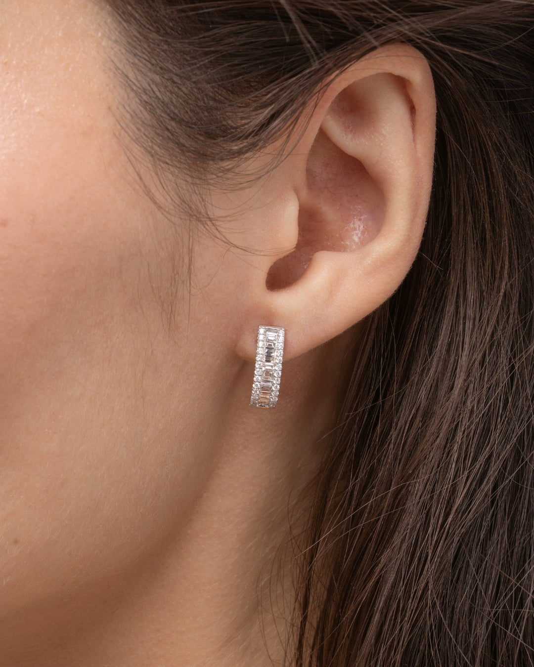 Close-up of Love Eternity Earrings, elegant diamond earrings set in 18ct white gold, showcasing sparkle and glamour.