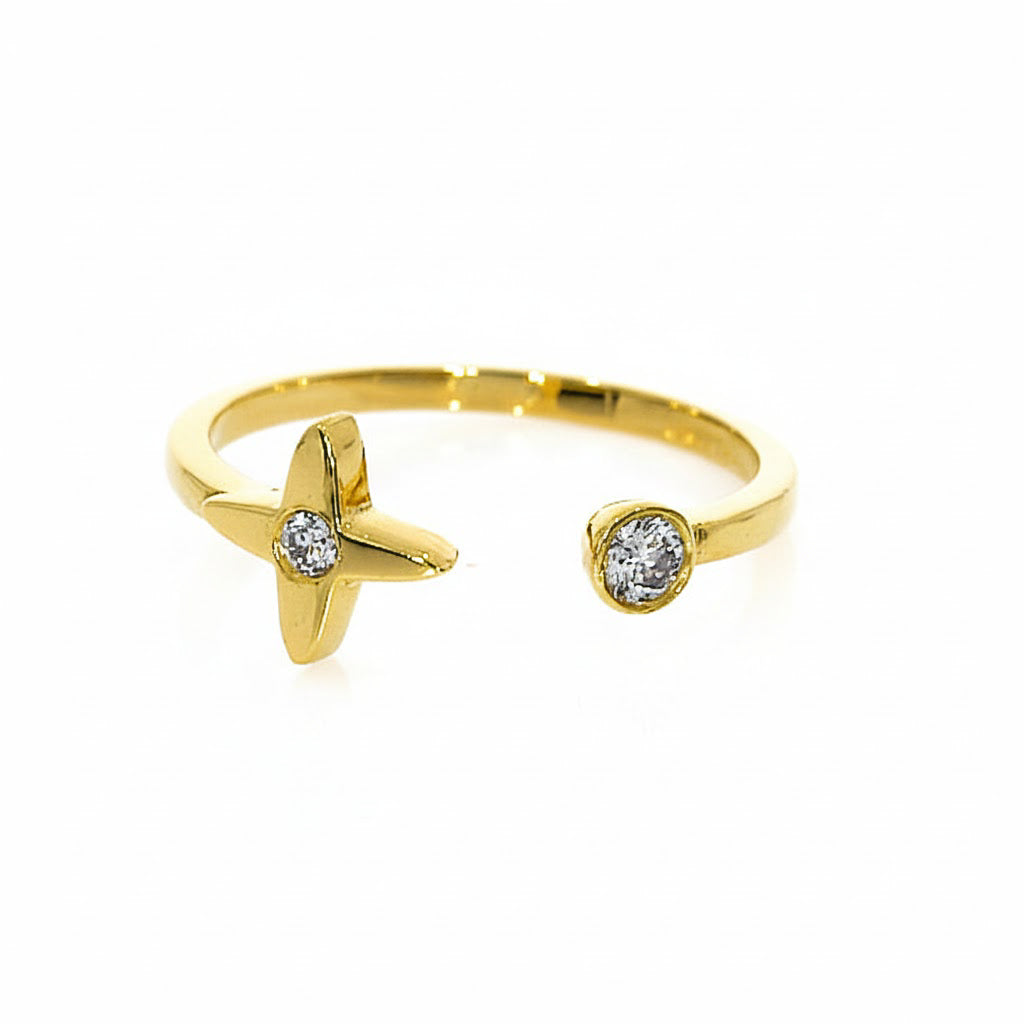 Mini Star Ring featuring a stunning yellow gold design with two round brilliant cut diamonds.