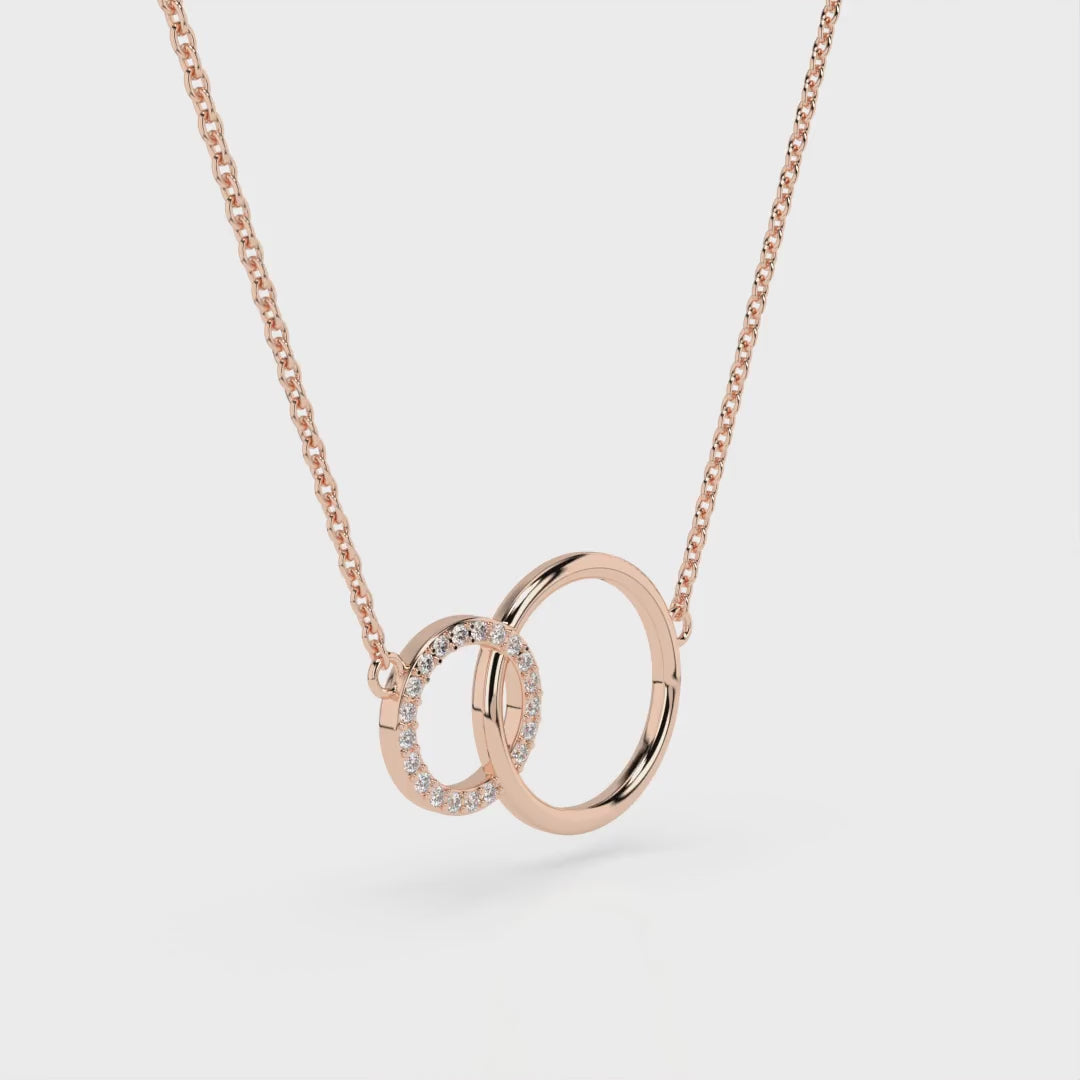 Circle and Sparkle Necklace with interlocking circles set with certified diamonds, capturing light beautifully.