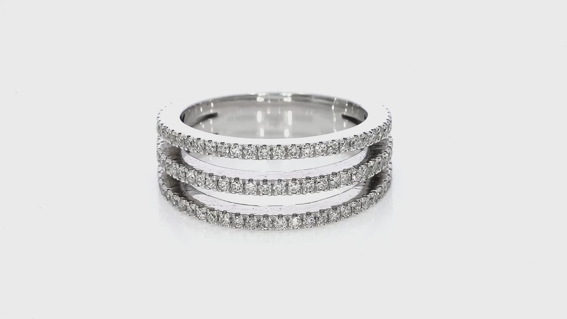 Three row diamond ring featuring sparkling white diamonds set in 18ct gold for elegant right hand wear or stacking.