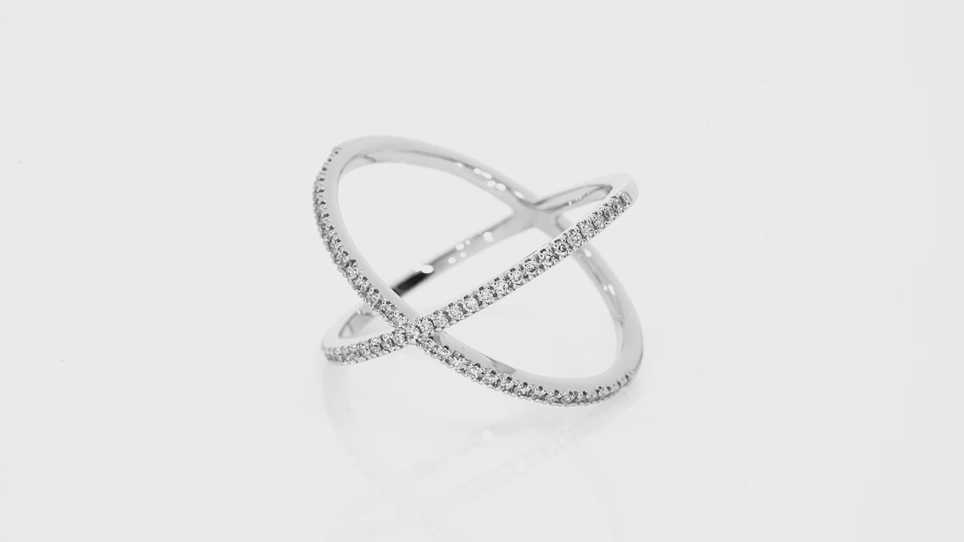 Video of Medium criss-cross ring with 0.23cts round brilliant cut diamonds, white gold colour set in 18ct gold.