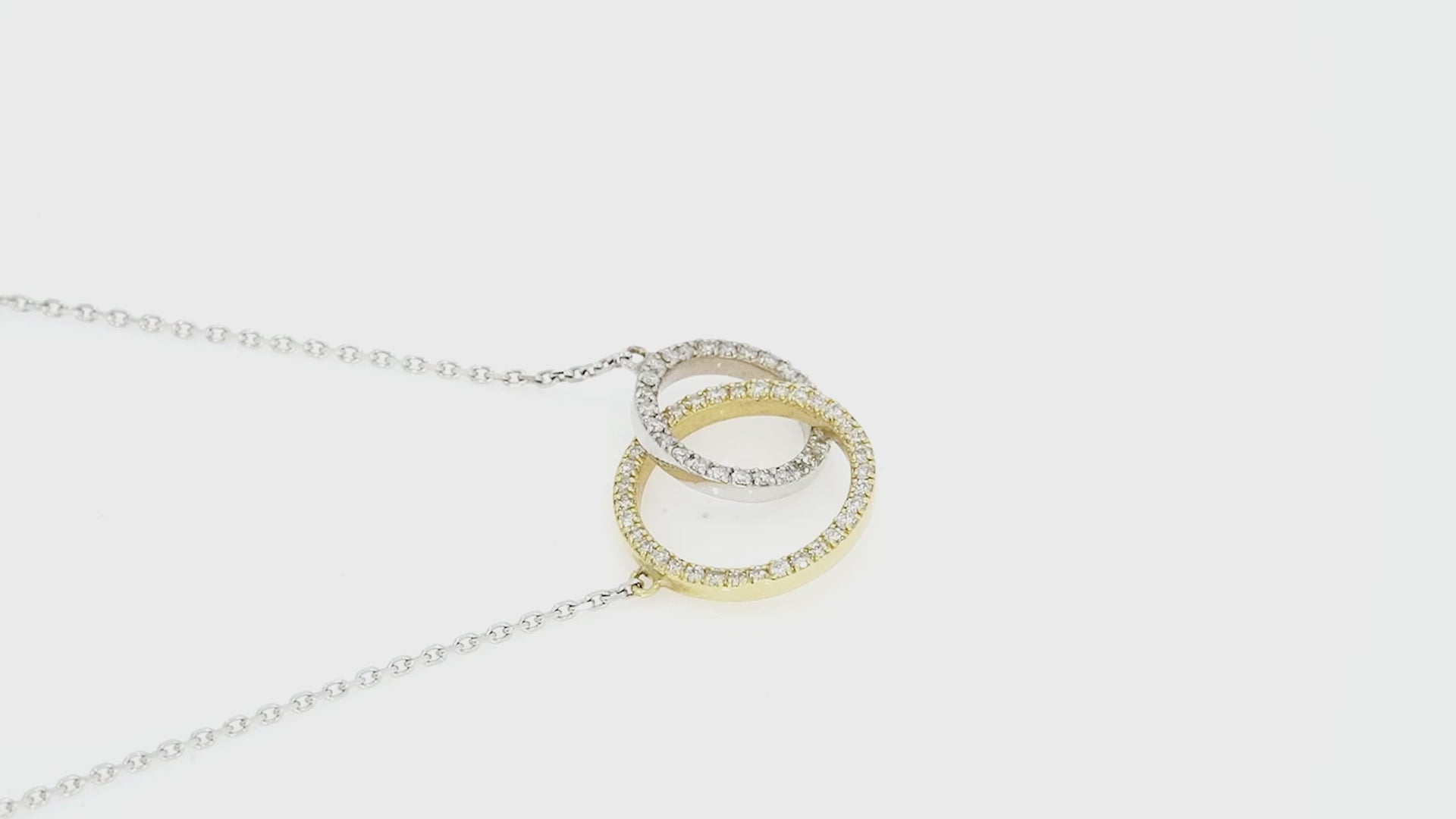 Circle Around The Sun necklace featuring certified diamond circles in 18ct gold with 0.29cts of diamonds