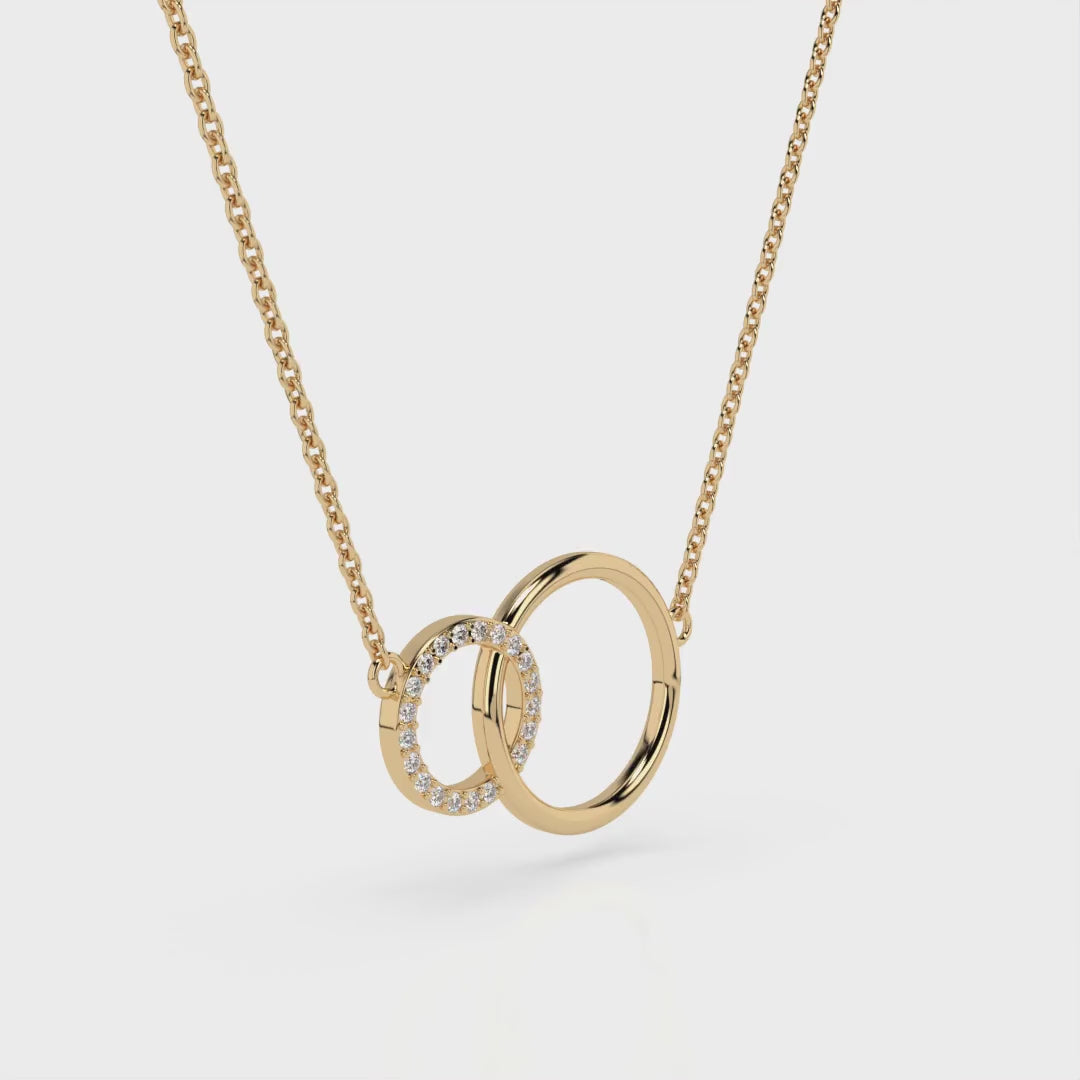 Circle and Sparkle Necklace featuring interlocking circles with certified diamonds glistening on a gold chain.