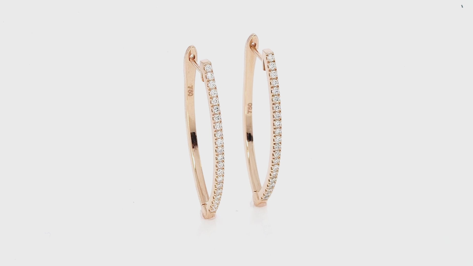 Bali hoop earrings featuring certified diamonds set in 18ct gold with a modern V shape design.